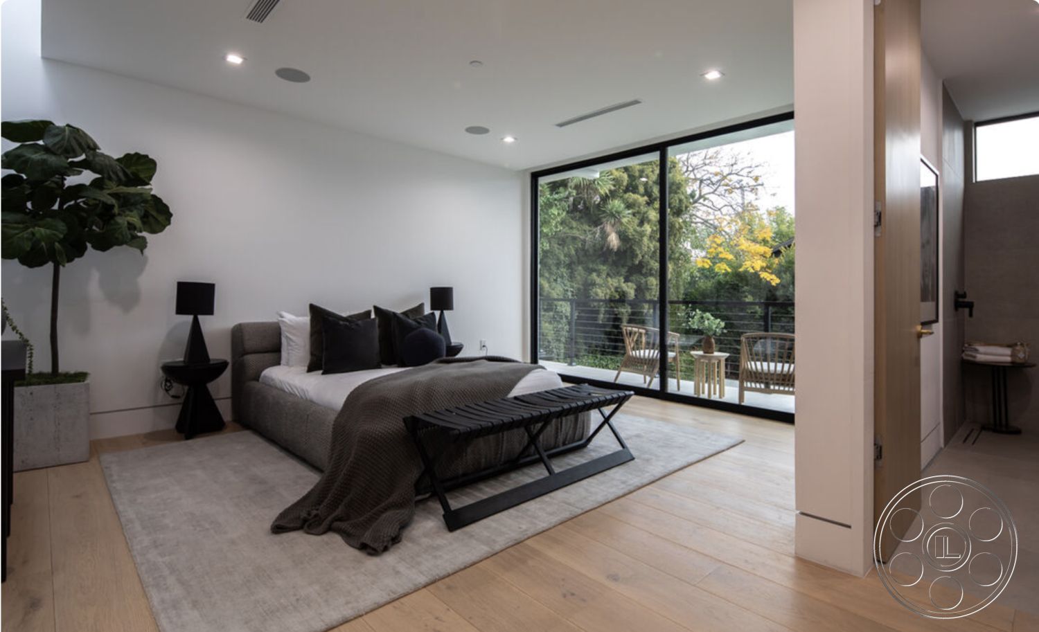 Modern 514 - minimalist decor, light wood cabinetry, floor-to-ceiling windows, decorative indoor plant, textured wall treatment, plush area rug, cozy reading nook, neutral color scheme, glass sliding door, contemporary interior, hardwood bedroom floors, open layout design, hidden lighting fixtures, modern upholstered bed, suburban bedroom setting, private balcony view