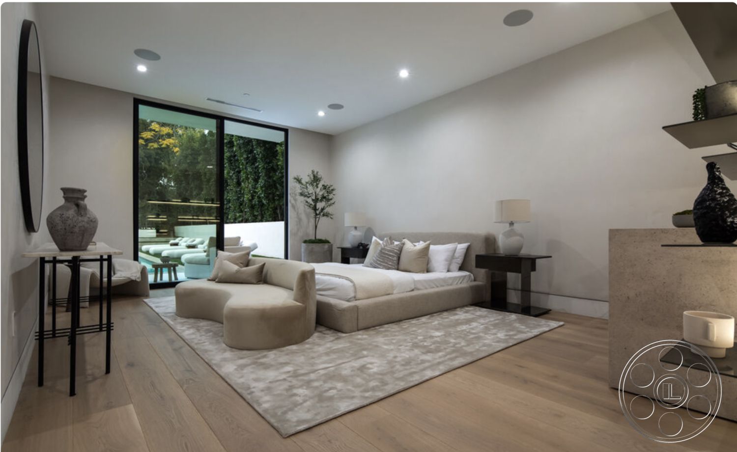 Modern 514 - neutral color palette, open space layout, floor-to-ceiling windows, textured plaster walls, modern nightstand, urban garden view, luxurious bedding, light gray area rug, contemporary furniture design, hardwood bedroom floors, interior plant decor, ambient recessed lighting, minimalist interior, exposed concrete accent wall, contemporary art display, natural light-filled room, modern decorative vase, cozy master bedroom, stylish bedside table lamp, circular accent chair, delicate throw pillows