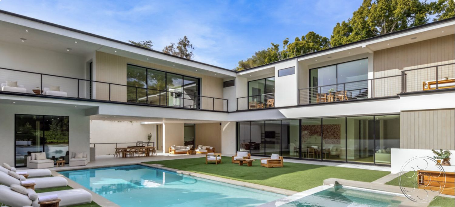 Modern 514 - neutral color palette, landscaped garden, glass sliding doors, rectangular swimming pool, urban setting, open-concept living space, outdoor lounge area, modern outdoor lighting, spacious courtyard, large floor-to-ceiling windows, concrete pool deck, sunken seating area, minimalist exterior, contemporary architectural style, exposed wood ceiling beams, grass lawn area, wooden deck furniture, multilevel outdoor space, shaded patio areas, interior lounge