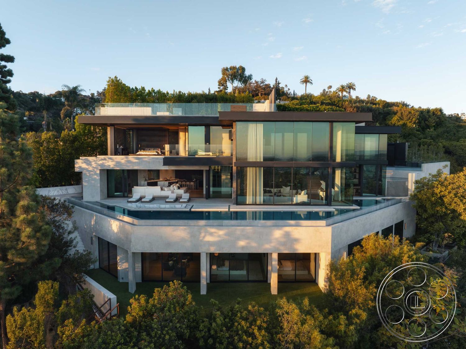 Modern 515 - interior wooden deck flooring, exterior landscaped garden, interior floor-to-ceiling windows, interior open concept layout, interior recessed lighting fixtures, interior minimalist design, exterior concrete walls, architectural style: contemporary, exterior stone pool deck, exterior infinity pool, exterior flat roof, setting: hillside location, exterior glass panel sliding doors, exterior patio with lounge chairs, interior modern kitchen with island, structural elements: exposed steel beams, wall treatment: smooth stucco wall, setting: urban view