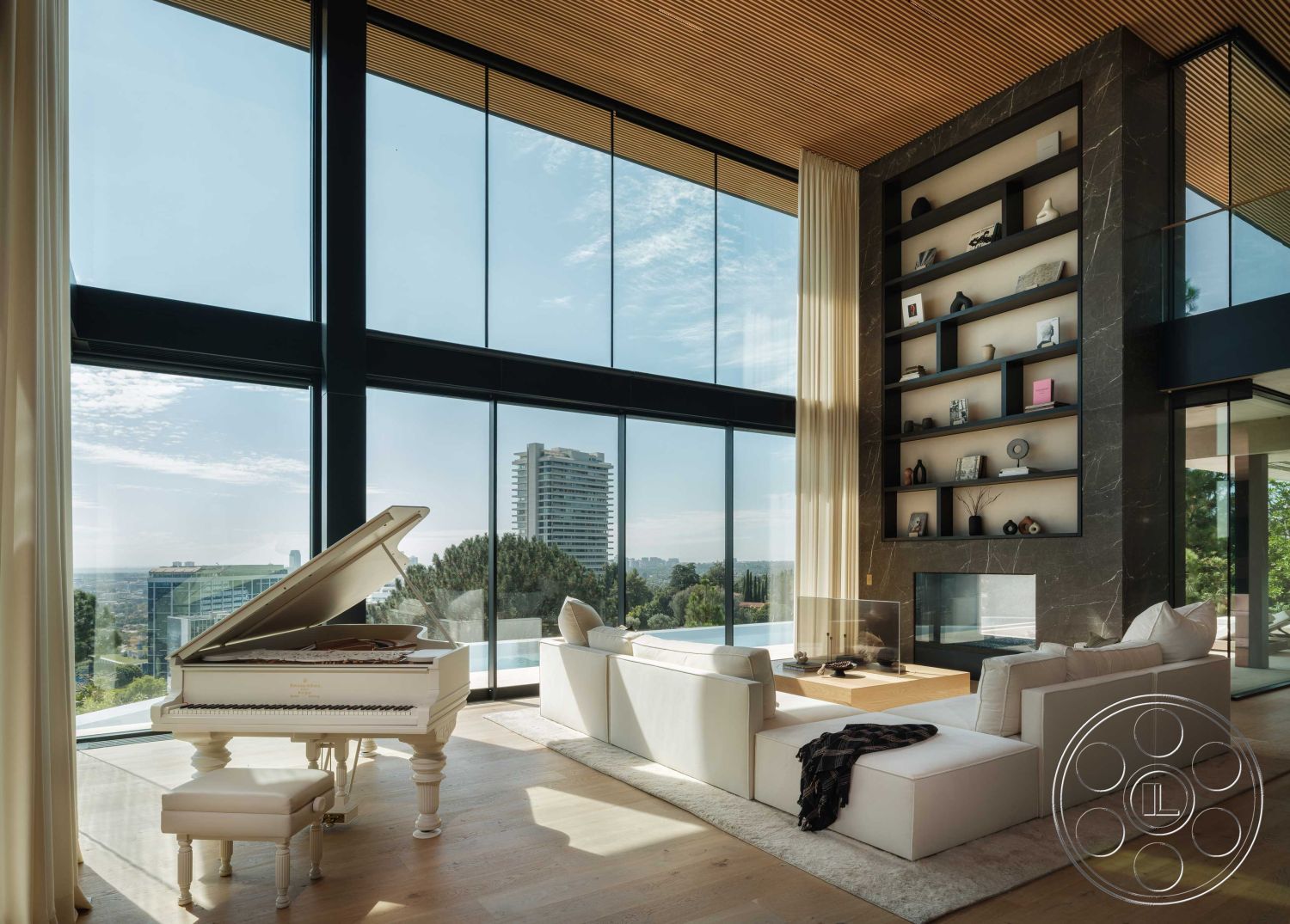 Modern 515 - large glass sliding doors interior, floor-to-ceiling glass windows interior, light hardwood living room floors interior, exposed wood ceiling planks interior, polished concrete fireplace surround interior, minimalist white sectional sofa interior, high-end grand piano interior, custom built-in bookshelf interior, neutral tone wool area rug interior, contemporary open-plan living area interior, marble accent wall interior, soft white drapery interior, modern coffee table with wood accents interior, scenic city skyline view exterior