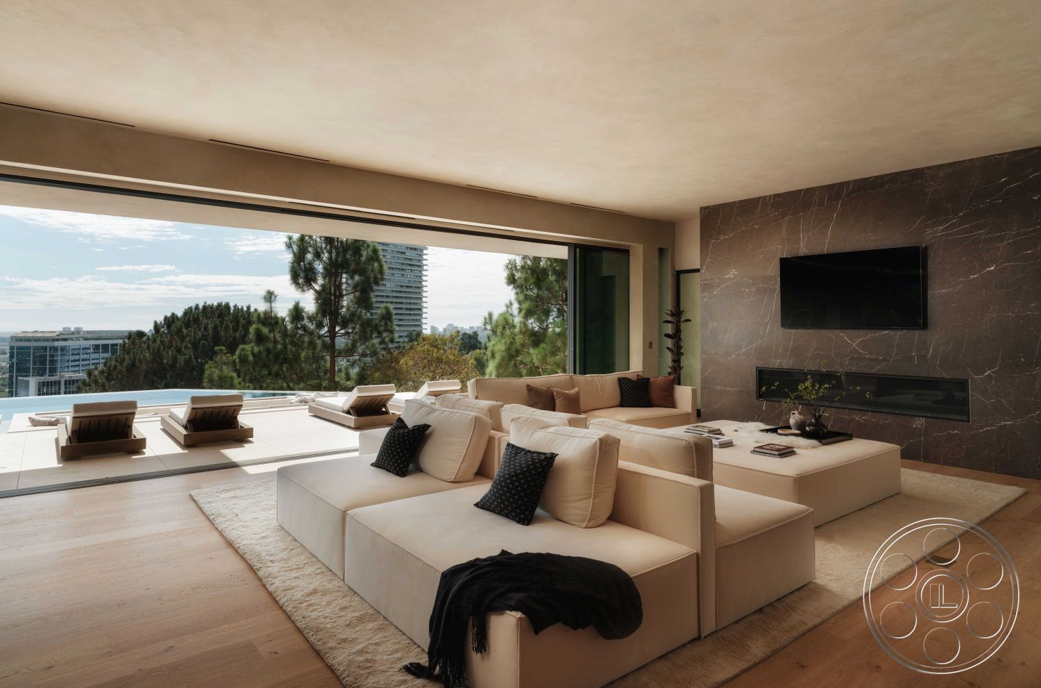 Modern 515 - contemporary furnishings, open concept living room, modern entertainment unit, exposed concrete ceiling, luxury living space, interior neutral color palette, interior natural light, interior hardwood flooring, interior textured plaster walls, interior floor-to-ceiling windows, interior minimalist coffee table, surrounding lush greenery, interior plush area rug, urban hillside setting, interior marble accent wall, exterior pool view, modern rectangular sectional sofa, exterior modern patio, interior indoor-outdoor flow