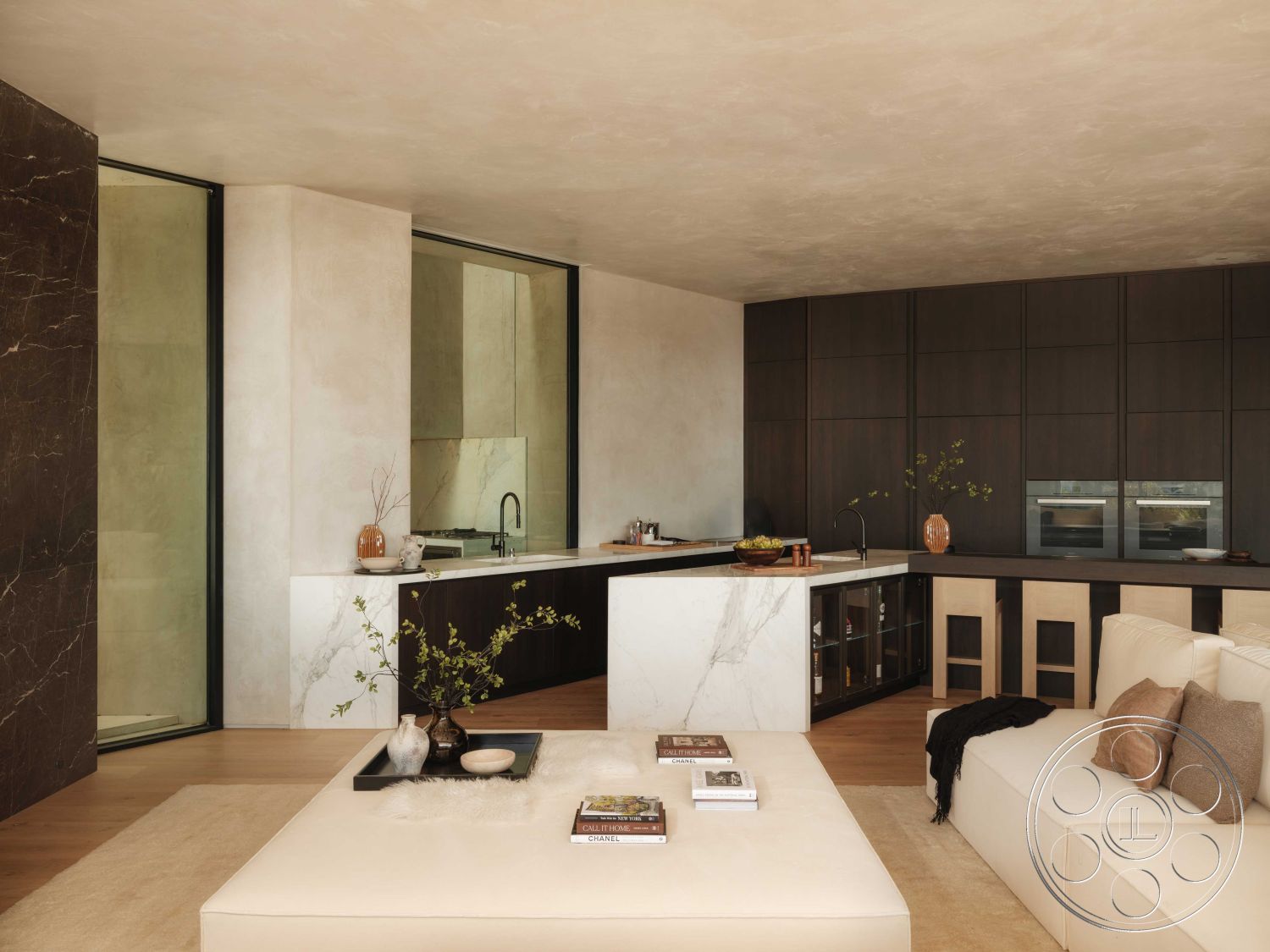 Modern 515 - modern kitchen, dark wood cabinetry, neutral color palette, minimalist design, open floor plan, decorative vases, light wood flooring, functional layout, sculptural coffee table, sliding glass doors, floor-to-ceiling windows, seamless indoor-outdoor flow, understated elegance, stylish armchairs, natural light integration, built-in kitchen appliances, marble kitchen island, textured ceiling finish, smooth plaster walls, contemporary living area