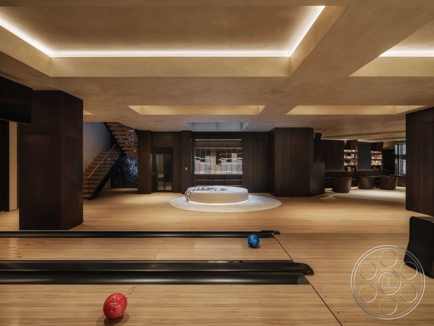 Modern 515 - neutral color palette, minimalist aesthetic, open floor plan, ambient lighting features, natural light from large windows, textured plaster walls, modern kitchen island, built-in cabinetry, luxury interior design, low-profile furniture, contemporary architectural style, exposed wood ceiling beams, recessed ceiling lighting, interior hardwood flooring, concrete wall finish, circular sitting area, vaulted ceiling detail, steel stair railing, seating area with modern armchairs, multi-functional game area, spacious recreational room