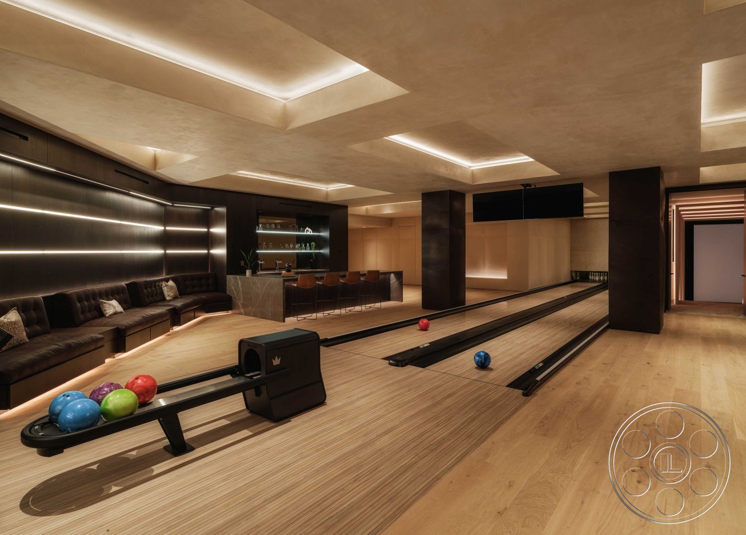 Modern 515 - minimalist decor, coffered ceiling, light wood flooring, modern furniture, glass shelving, dark wood paneling, open layout design, LED recessed lighting, smooth wall texture, upholstered bench seating, interior bowling alley, custom bar area, marble bar countertop, colorful bowling balls, rectangular bowling lanes, luxury game room, background soft lighting, sophisticated entertainment space, hidden media equipment