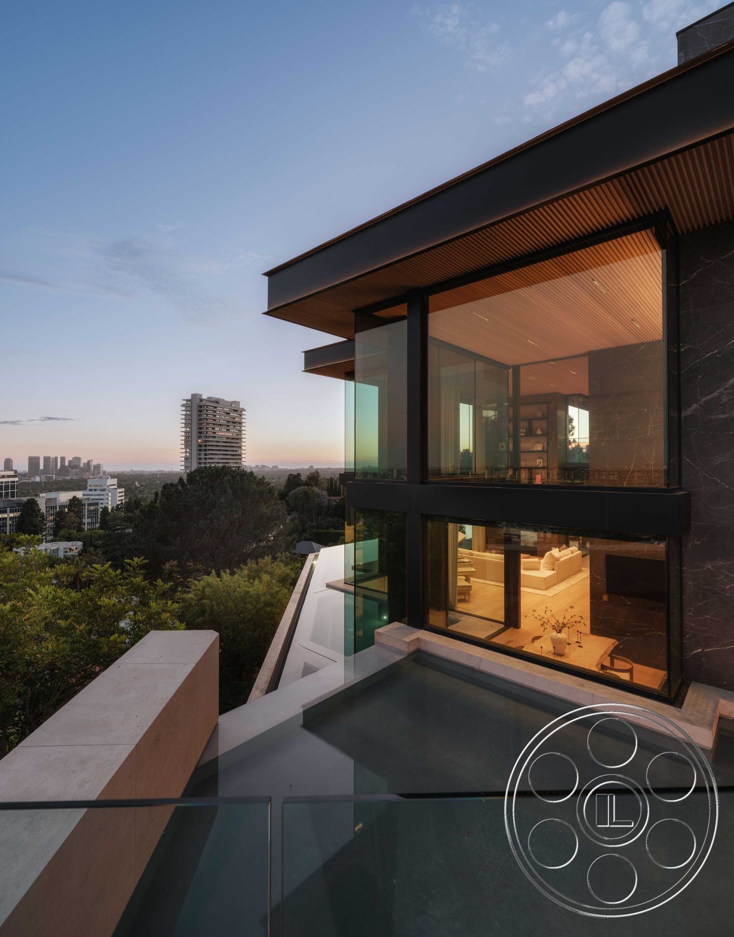 Modern 515 - exterior concrete patio floor, exterior concrete pool border, interior floor-to-ceiling windows, interior open floor plan, interior wood beam ceiling, exterior infinity pool, interior marble feature wall, exterior concrete steps, interior vaulted living room ceiling, exterior glass walls, exterior mountain backdrop, architectural Modern style, exterior landscape view, exterior sleek rectangular design, interior minimalistic furnishings, interior designer kitchen, exterior urban skyline visibility, exterior polished stone details