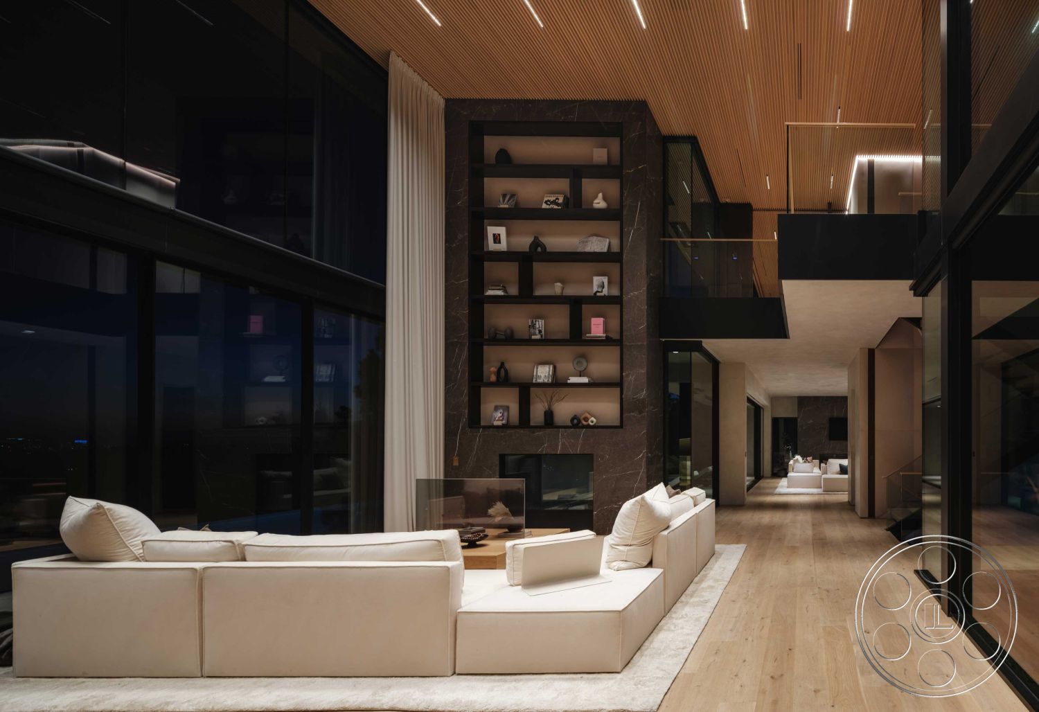 Modern 515 - neutral color palette, textured area rug, floor-to-ceiling windows, open-concept layout, modern art display, recessed lighting fixtures, hardwood flooring in living room, interior minimalist design, luxury home interior, vertical wood slat ceiling, glass wall with city skyline view, contemporary shelving units, stone accent wall with built-ins, modern fireplace with black marble surround, soft linen sectional sofa, curved staircase with glass railings, designer decor accents, spacious hallway leading to entertaining areas, integrated smart home technology