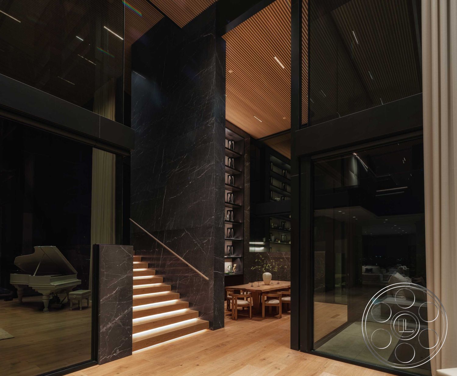 Modern 515 - dark color scheme, hardwood flooring living room, floor-to-ceiling windows interior, glass partition walls interior, sleek architectural lines, ambient lighting design, contemporary home design interior, wood ceiling panels interior, black marble feature wall interior, floating stairs with LED lighting, modern dining area with wooden table, high-ceilinged open space interior, minimalist aesthetic with functional furniture, interior of a luxury living space, monochrome color palette, spacious layout with distinct areas