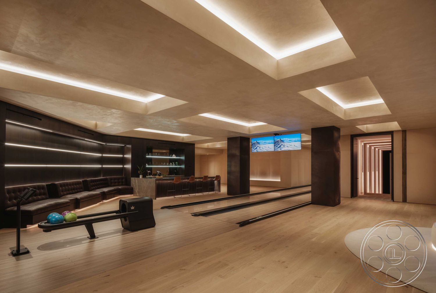 Modern 515 - ambient lighting, muted color palette, modern architectural details, contemporary minimalist design, cohesive design elements, interior space with wooden bowling lane, light wood plank flooring in recreational room, plaster ceiling with recessed lighting, dark wood paneling on seating wall, marble bar with built-in cabinetry, upholstered sectional seating, decorative wall LED strip lighting, curved seating area with modern design, open layout recreational area, floating ceiling elements, entertainment area with multiple screens, stylish bar counter with stools, spacious lounge with social atmosphere, feature wall with sleek finishes