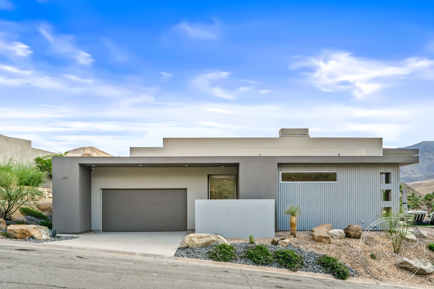 Palm Springs 109 - exterior, modern architecture, large glass windows, concrete driveway, desert landscaping, geometric forms, monochromatic color palette, flat roof design, mountain view setting, stucco exterior walls, rock garden features, horizontal metal siding, minimalist façade, front porch overhang