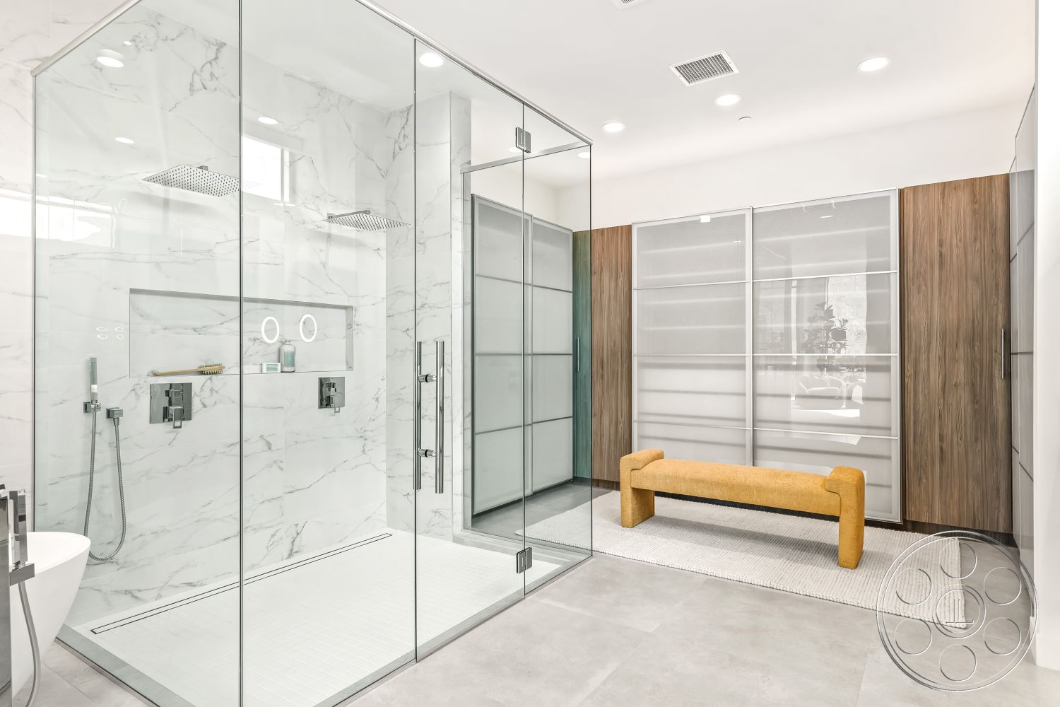 Palm Springs 109 - interior recessed lighting fixtures, interior textured area rug, interior minimalist design elements, interior marble shower walls, interior light wood cabinetry, interior frameless glass shower doors, interior freestanding bathtub, interior rainfall shower heads, interior dual shower fixtures, interior white marble tile flooring, interior gray porcelain floor tiles, interior modern bathroom bench