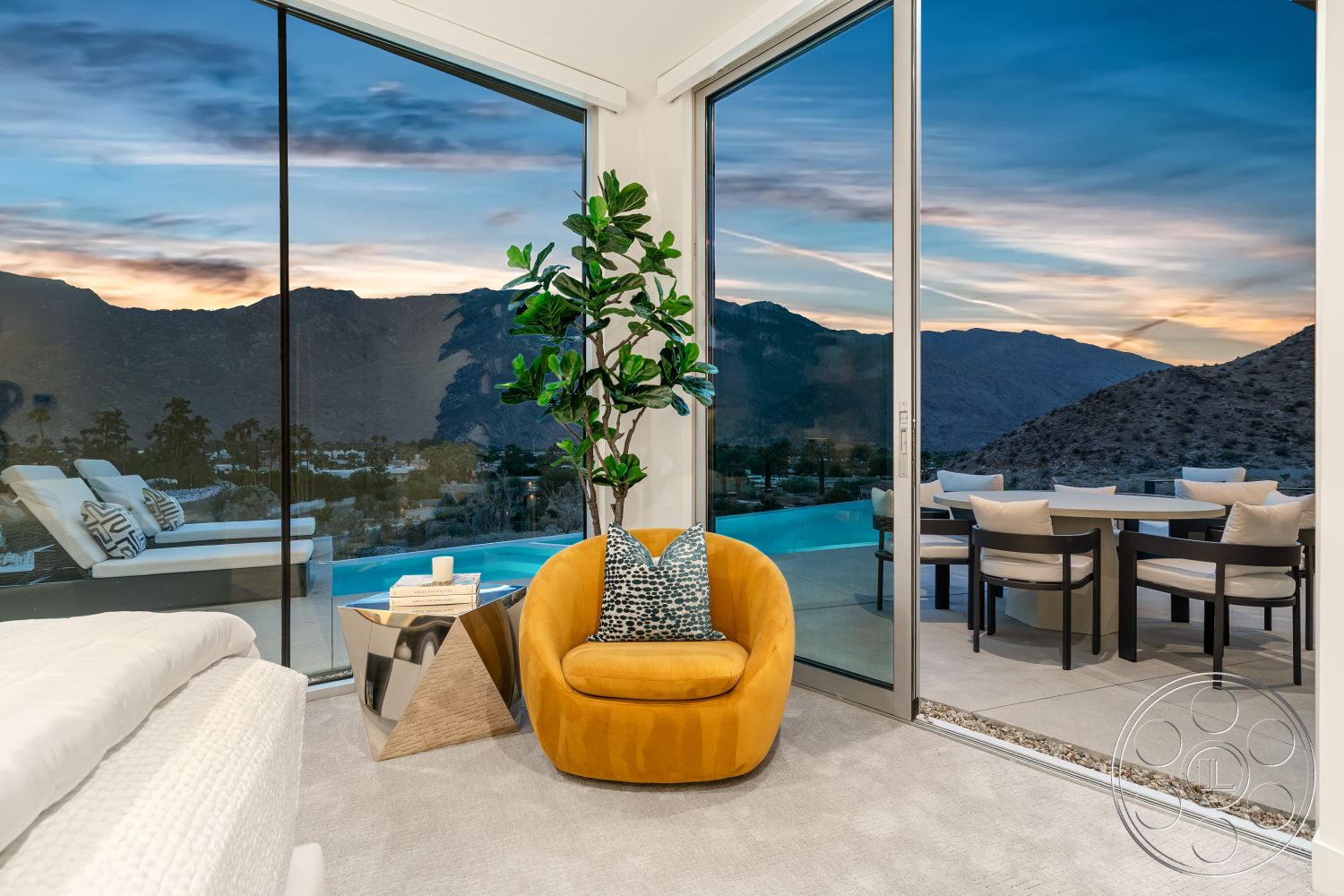 Palm Springs 109 - neutral color palette, outdoor dining area, contemporary coffee table, minimalist furniture design, floor-to-ceiling glass sliding doors, exterior infinity pool, mountain view backdrop, expansive glass windows, potted indoor plant, interior contemporary living room, light-colored carpet flooring, modern yellow accent chair, geometric throw pillow design, luxurious hillside property