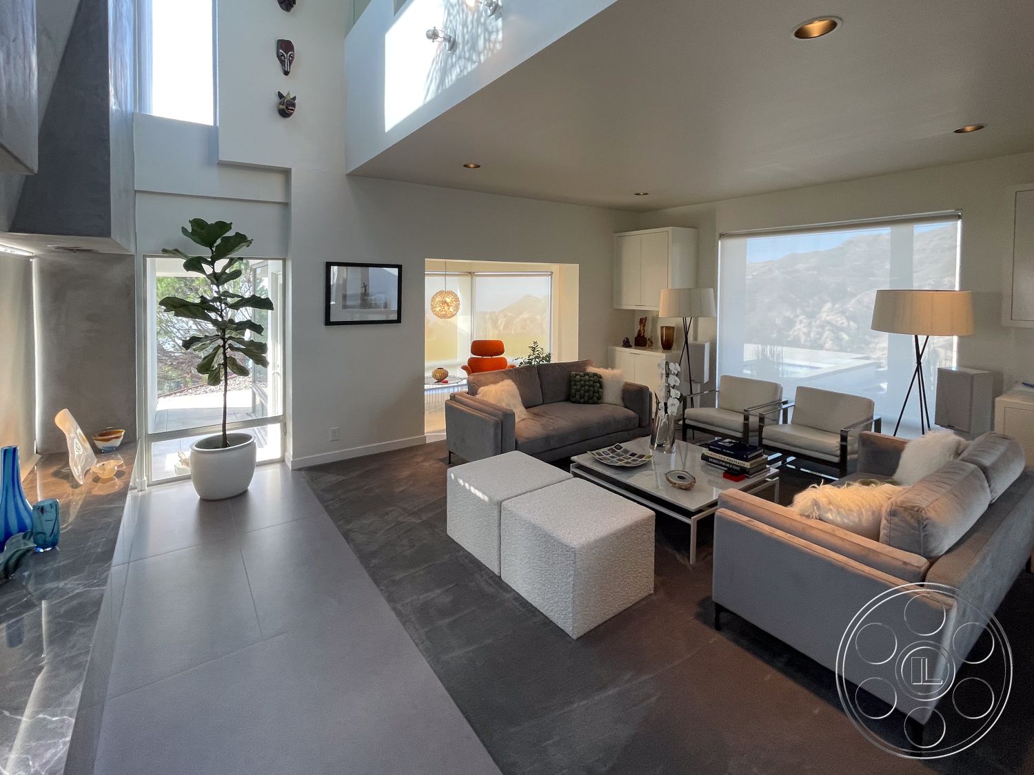 Modern 56 - minimalist decor, neutral color palette, polished concrete flooring, ambient lighting, artistic wall decorations, seamless indoor-outdoor flow, large floor-to-ceiling windows, light-filled environment, textured wall treatments, indoor plant decor, exposed wood ceiling beams, open concept living area, modern furniture design, luxurious contemporary style, functional living space, concrete wall accents, modern glass light fixtures, multifunctional coffee table, geometric furniture shapes