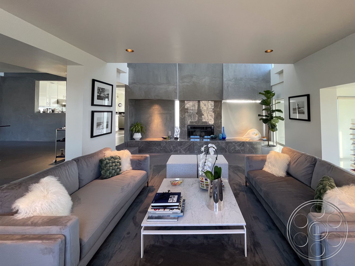 Modern 56 - neutral color palette, polished concrete flooring, open concept living room, textured wall finishes, urban residential setting, interior living space, recessed lighting fixtures, floor-to-ceiling glass windows, exposed concrete accent wall, modern interior design style, modern marble coffee table, soft fabric upholstered sofas, contemporary decorative plant accents, minimalistic art wall decor, steel fireplace insert, shag area rug in living room