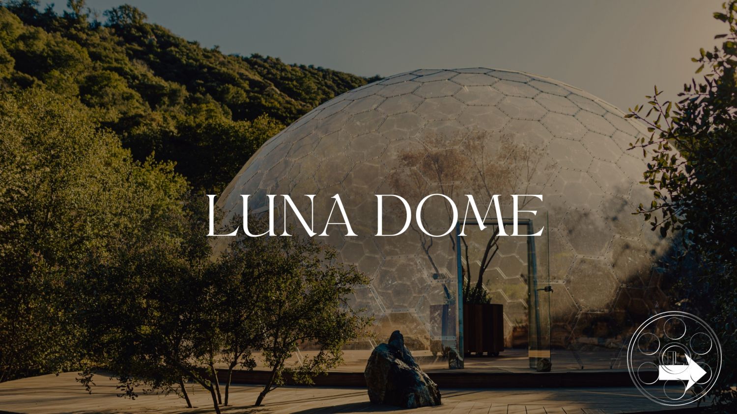 Topanga Retreat - surrounding greenery, outdoor living space, eco-friendly materials, sustainable architecture, minimalist design aesthetic, biophilic design elements, natural wood deck flooring, mountain landscape setting, exterior glass dome structure, hexagonal glass panels