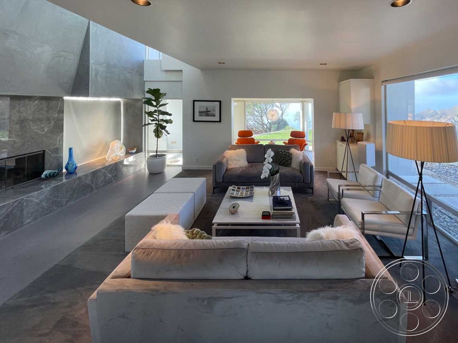 Modern 56 - interior recessed lighting, interior white painted walls, interior wood beam ceiling, interior minimalist design, interior polished concrete flooring, contemporary sectional sofa, interior marble feature wall, interior decorative potted plants, interior low-profile furniture, interior open concept living room, modern glass windows with city view, interior linear fireplace, interior sleek metal furniture, interior mid-century modern accents, interior square coffee table