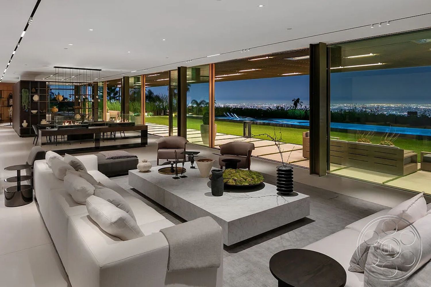 Modern 517 - minimalist decor, neutral color palette, polished concrete floor, textured throw pillows, soft gray sectional sofa, dark wood dining table, large sliding glass doors, modern art pieces, built-in bookshelves, modern lounge chairs, concrete patio flooring, wood beam ceiling, floor-to-ceiling glass walls, landscaped garden terrace, contemporary fireplace design, city skyline view from interior, interior modern open-concept living room, white marble coffee table, outdoor infinity pool view, black metal pendant lighting, elegant home accessories