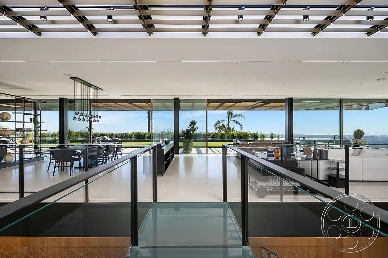 Modern 517 - neutral color palette, tile flooring, textured accent wall, outdoor seating area, minimalist furniture, open concept living space, outdoor terrace, elegant dining table, modern dining area, stylish home decor, exterior landscaped garden view, concrete patio floor, scenic hillside location, metal ceiling beams, contemporary architectural elements, spacious living room layout, interior glass wall design, floating glass railing, natural light filled rooms, panoramic floor-to-ceiling windows, decorative table settings, sleek kitchen cabinetry, bold pendant lighting, wood accent shelves