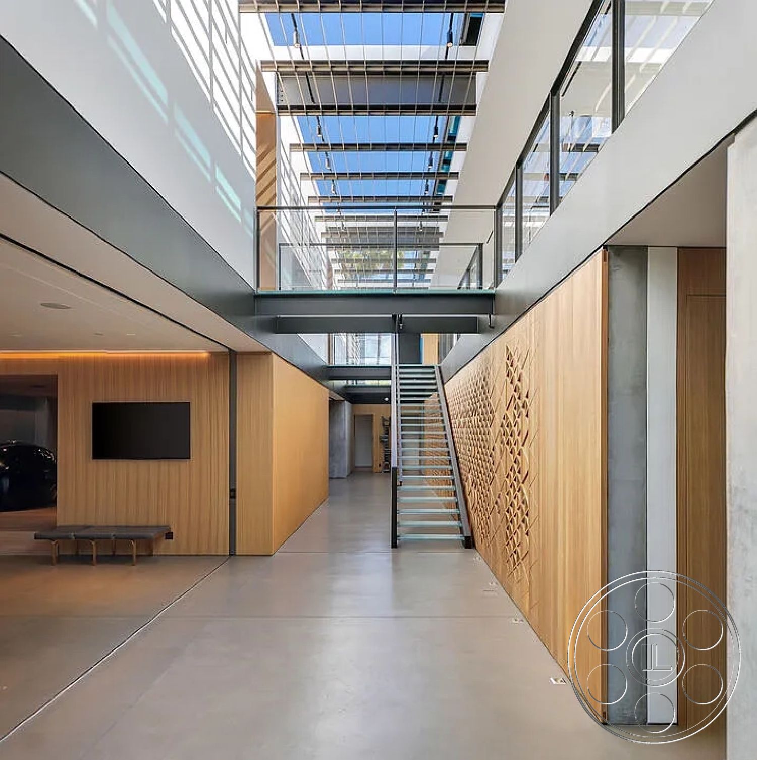 Modern 517 - polished concrete flooring, floor-to-ceiling windows, open-concept living area, contemporary architectural design, glass balcony railing, high ceiling with skylights, modern recessed lighting, interior concrete floor, textured plaster wall accents, exposed wood paneling wall, steel staircase with glass treads, rectangular open space layout, minimalist wall art details, built-in wall-mounted television, industrial-style ceiling beams, geometric staircase design, vertical grain wood wall feature