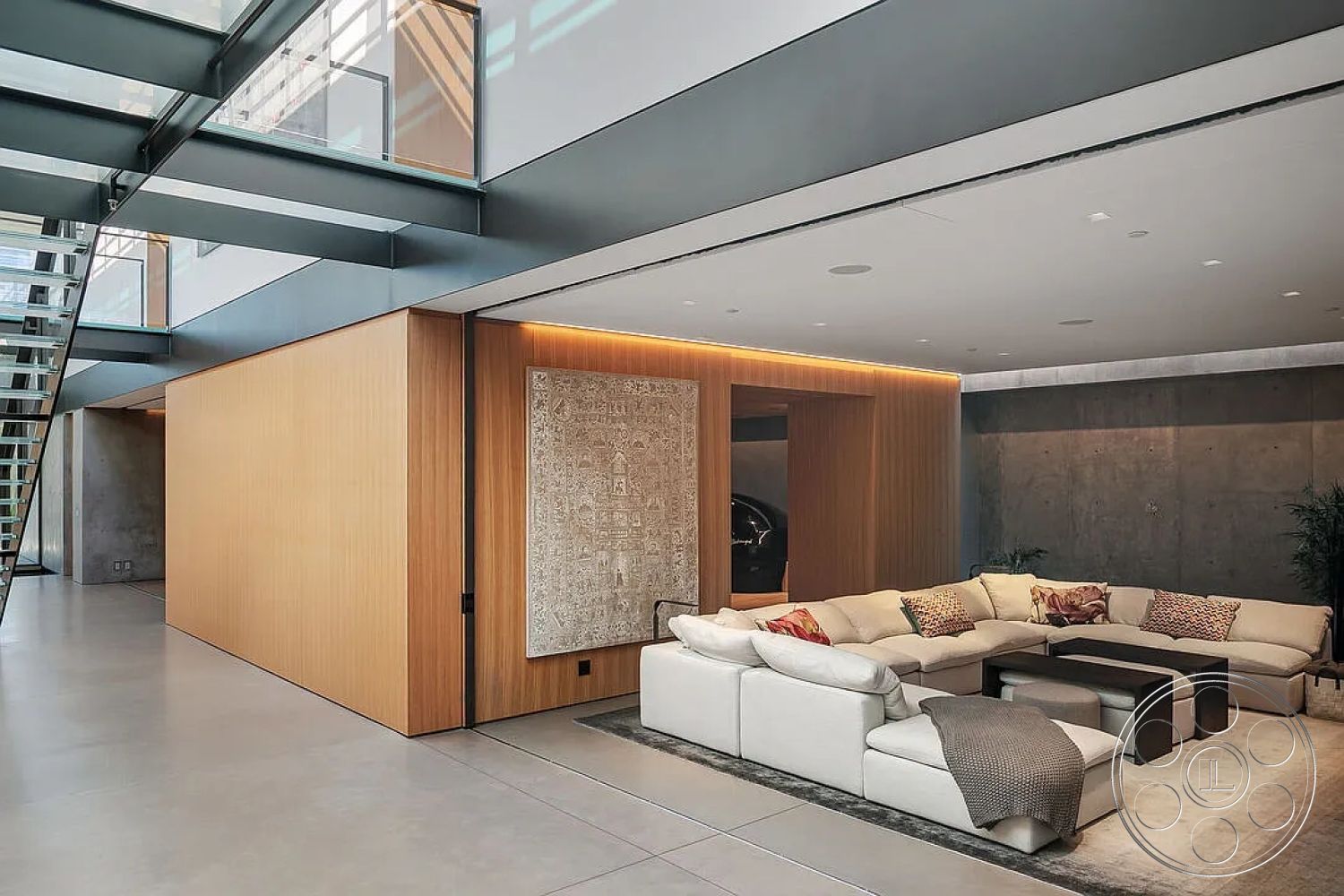 Modern 517 - neutral color palette, open floor plan, exposed concrete walls, modern coffee table, floor-to-ceiling windows, contemporary aesthetic, glass stair railing, recessed LED lighting, wood panel accent wall, simple geometric forms, textured wall art feature, floating glass staircase, minimalist living room design, L-shaped sectional sofa, light gray polished concrete flooring, high ceiling with beams