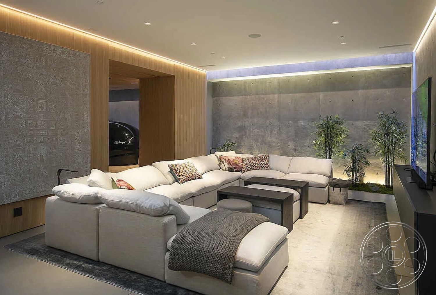 Modern 517 - indoor plants, open floor plan, minimalist coffee table, large flat-screen TV, textured plaster wall, natural fiber area rug, contemporary design style, modern sectional sofa, soft seating area, concrete accent wall, built-in cabinets, recessed lighting details, wood plank ceiling treatment, fabric throw pillows, neutral-toned color palette