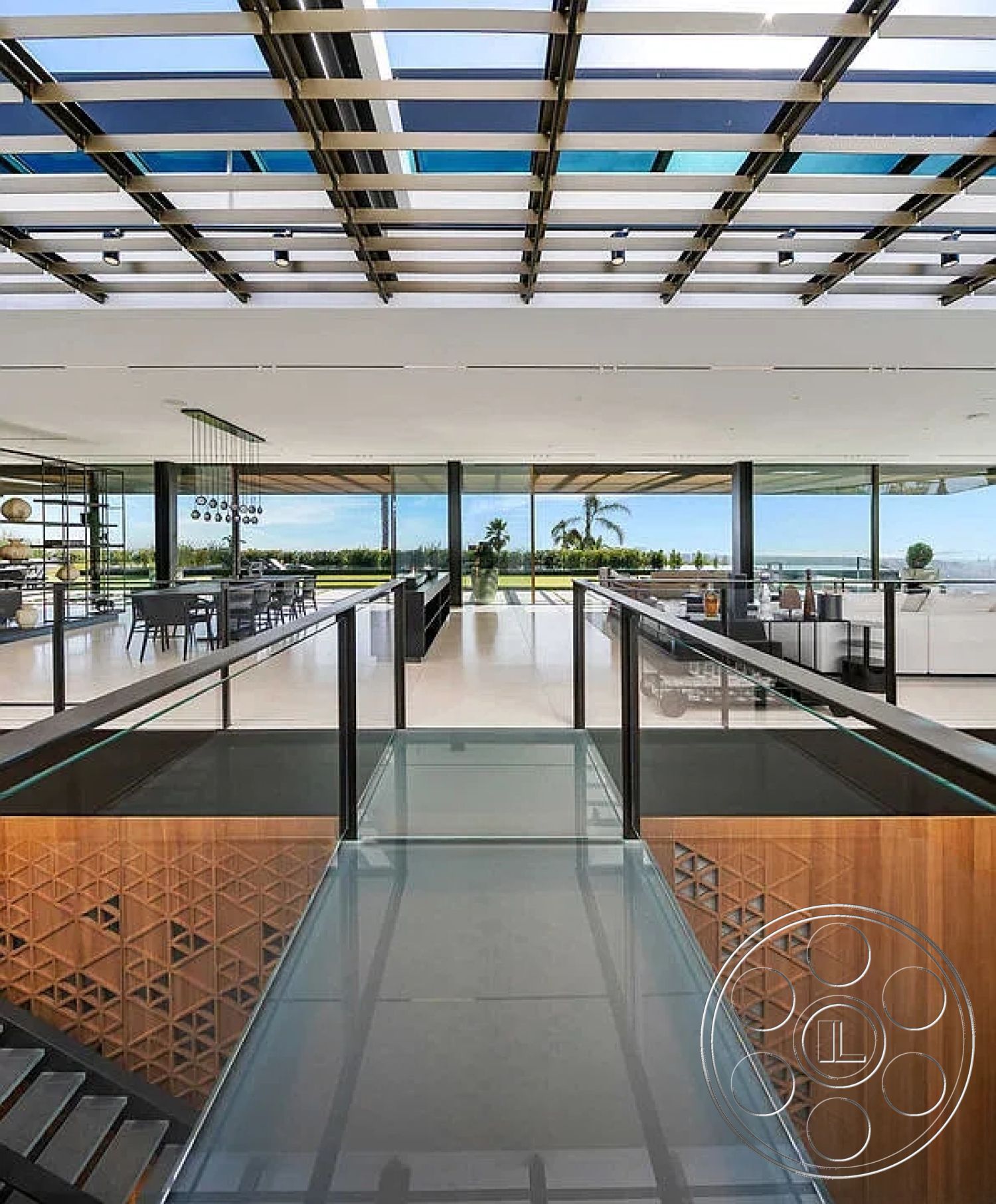 Modern 517 - minimalist design elements, modern pendant lighting, ceramic tile flooring, floor-to-ceiling windows, textured wall paneling, wood accent wall, monochromatic color scheme, contemporary dining area, geometric ceiling design, natural light from skylight, interior open concept living area, glass wall partition, urban landscape setting, high ceilings with exposed beams, exterior glass railing balcony, steel structural support beams, outdoor patio with ocean view, modern kitchen island with bar seating, luxury residential architecture