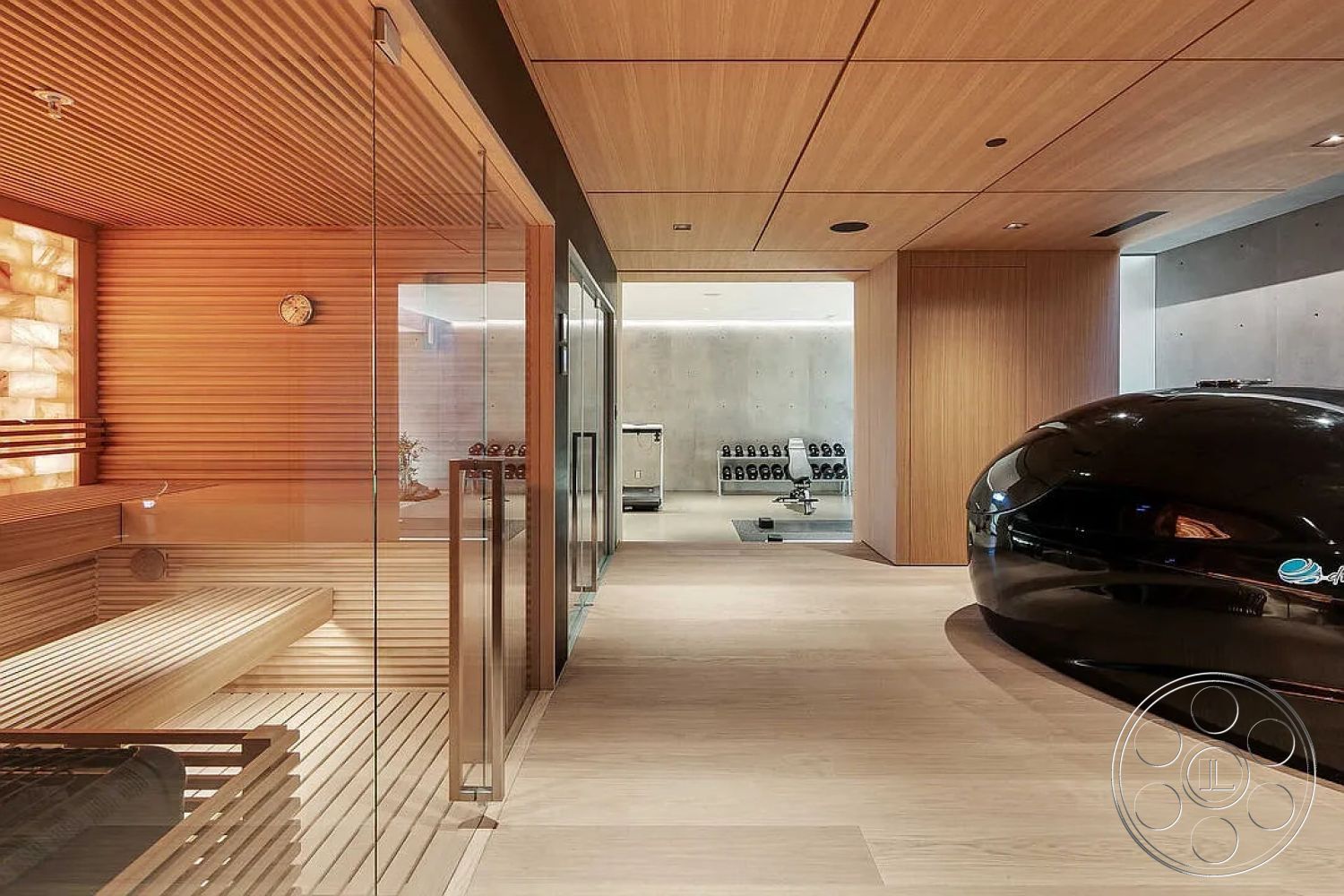 Modern 517 - minimalist design with clean lines, interior sauna with wooden slat walls, glass partition walls with wood framing, concrete accent wall behind fitness area, light wood ceiling with recessed lighting, laminate flooring in sauna area, black fiberglass float tank for relaxation, built-in wooden benches in sauna, ambient backlighting behind salt wall, modern clock fixture in sauna, fitness area with free weights, spa-like atmosphere with natural materials, open layout connecting sauna to fitness space, large glass door leading to workout area