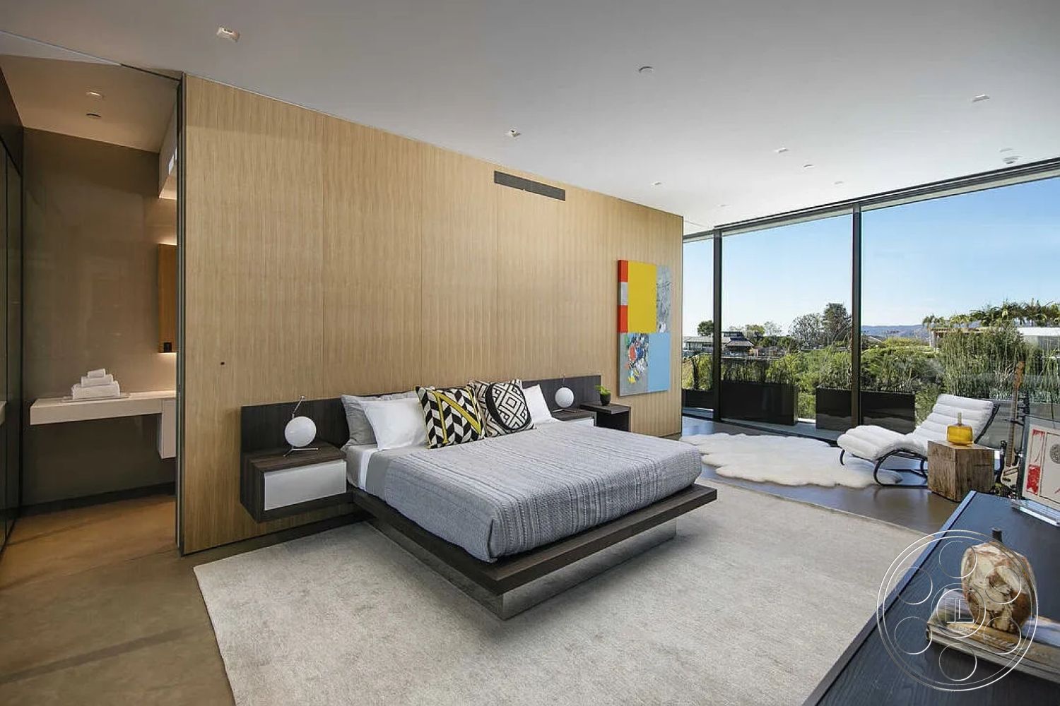 Modern 517 - interior hardwood bedroom floors, interior textured area rug, exterior floor-to-ceiling windows, exterior city skyline view, interior wood panel accent wall, interior concrete floor finish, interior modern minimalist bedroom design, interior geometric decorative throw pillows, interior sleek nightstands with built-in lighting, exterior balcony planters with greenery, exterior contemporary art installation, interior light wood scheme, interior soft gray bedding, interior glass partition to bathroom, exterior open space layout