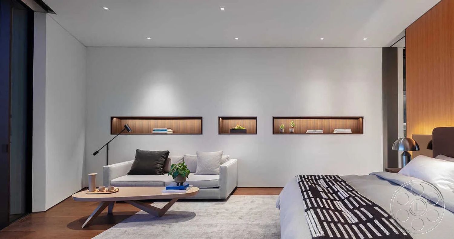 Modern 517 - neutral color palette, decorative plants, soft gray sofa, modern table lamp, cozy reading nook, built-in shelving units, spacious open layout, hidden lighting fixtures, contemporary living room design, minimalist white walls, hardwood bedroom flooring, floating wood coffee table, warm wood accent wall, sparse decorative accents, architectural focal point, textured fabric throw, geometric patterned bed throw