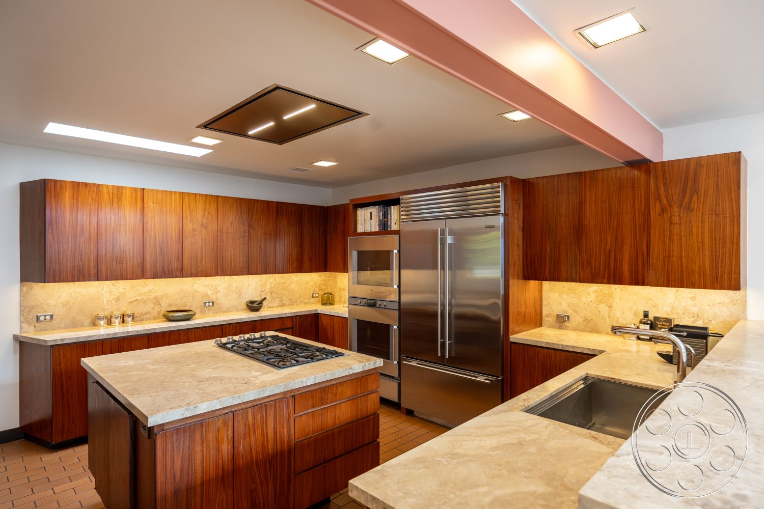 MCM 27 - interior kitchen with recessed lighting, interior kitchen with minimalist design, interior kitchen with stainless steel appliances, interior kitchen with open layout, interior kitchen with under-cabinet lighting, interior kitchen with hardwood cabinetry, interior kitchen with polished marble countertop, interior kitchen with textured wall finish, interior kitchen with gas cooktop, interior kitchen with built-in ovens, interior kitchen with ceramic tile flooring, interior kitchen with flushmount ceiling lights, interior kitchen with handleless cabinetry, interior kitchen with contrasting color palette