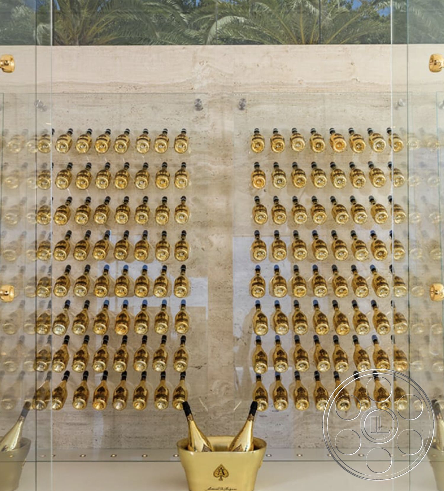 Modern 518 - minimalist aesthetic, ambient lighting, marble flooring, exposed stone feature wall, glass display wall, gold champagne bottles, textured stone background, modern wine cellar, interior wine storage, luxury champagne presentation, high-end hospitality design, decorative ice bucket