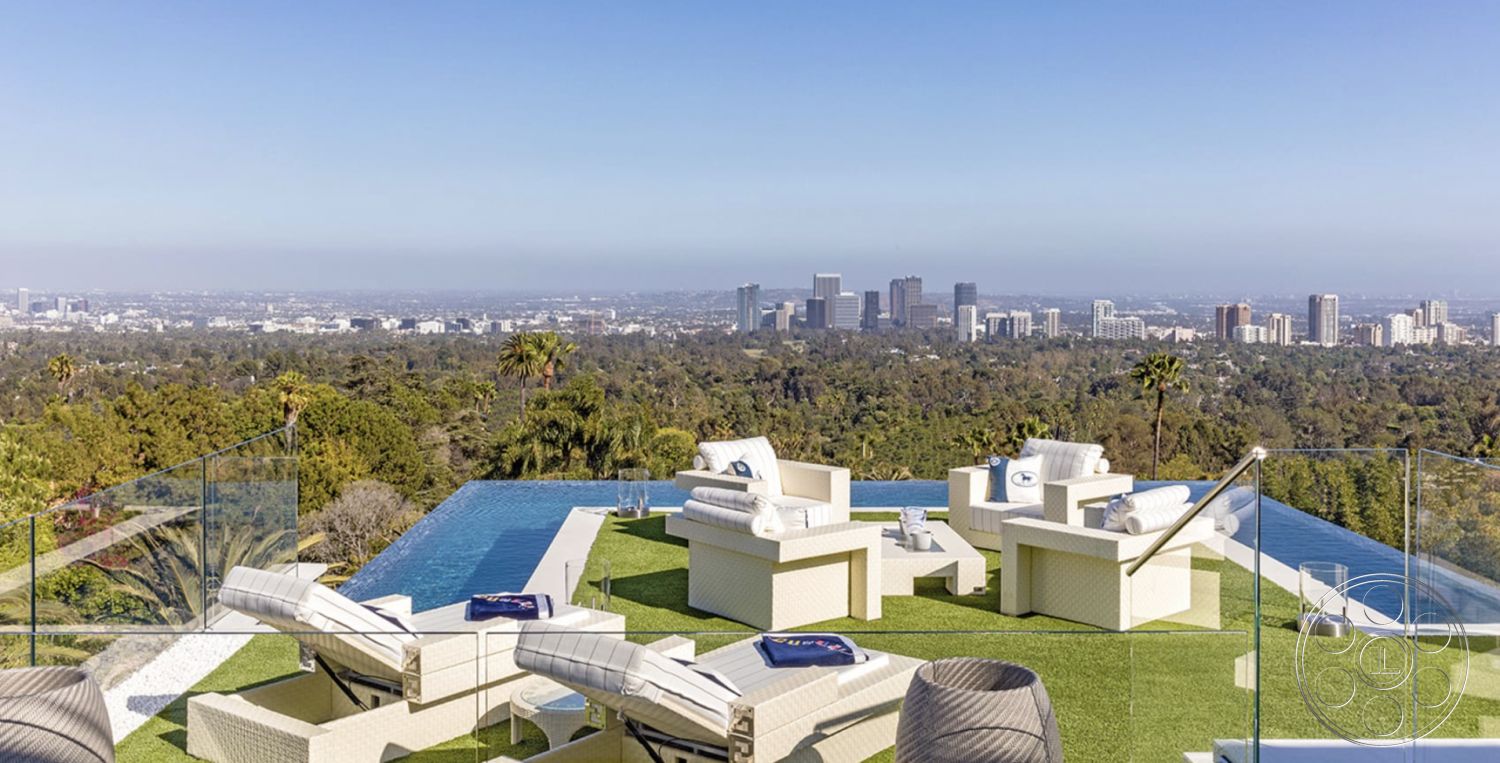 Modern 518 - city skyline view, contemporary outdoor seating, horizontal wood slats, modern minimalist design, palm tree landscape, exterior glass wall, scenic hillside location, glass railing terrace, infinity pool edge, luxury residential exterior, outdoor coffee table, artificial grass patio flooring, elevated deck area, sunshade lounger, open-air entertainment space