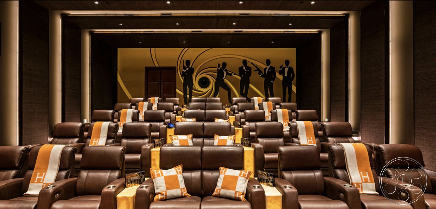 Modern 518 - contemporary seating arrangement, multi-tiered seating layout, interior home theater, reclining leather theater seats, walnut wood paneling walls, acoustic soundproof wall treatments, cinema-style illuminated ceiling, ambient LED lighting details, dark wood accent trim, soft plush carpet flooring, themed decorative wall murals, modern entertainment system, luxury cinema experience, cozy screening room atmosphere