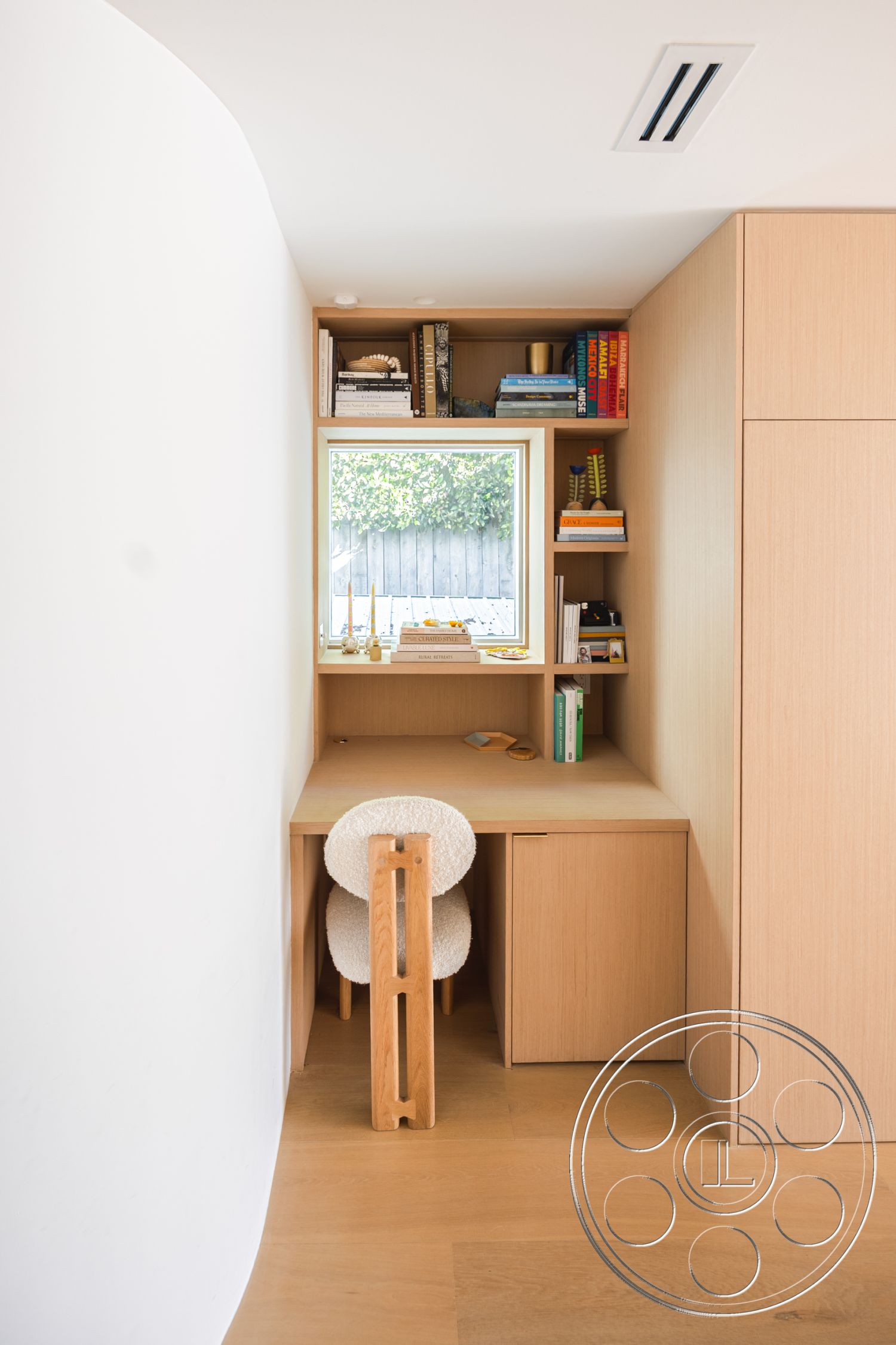 Modern 519 - interior white painted walls, interior built-in cabinetry, interior minimalist design elements, interior textured wall finish, interior ambient recessed lighting, interior organized workspace, interior light wood flooring, interior oak wood desk, interior oak wood shelving, interior curved wall treatment, interior ergonomic office chair, interior decorative bookshelf, interior contemporary workspace design, interior soft woven chair upholstery