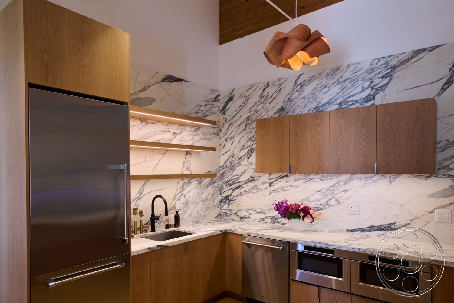 Office 129 - contemporary kitchen design, luxury kitchen space, interior kitchen with marble countertop, interior kitchen with black faucet, interior kitchen with oak cabinetry, interior kitchen with open shelving, interior kitchen with marble backsplash, minimalist kitchen aesthetic, interior kitchen with stainless steel refrigerator, interior kitchen with built-in stainless steel appliances, interior kitchen with LED shelf lighting, interior kitchen with modern pendant light fixture, interior kitchen with high ceilings