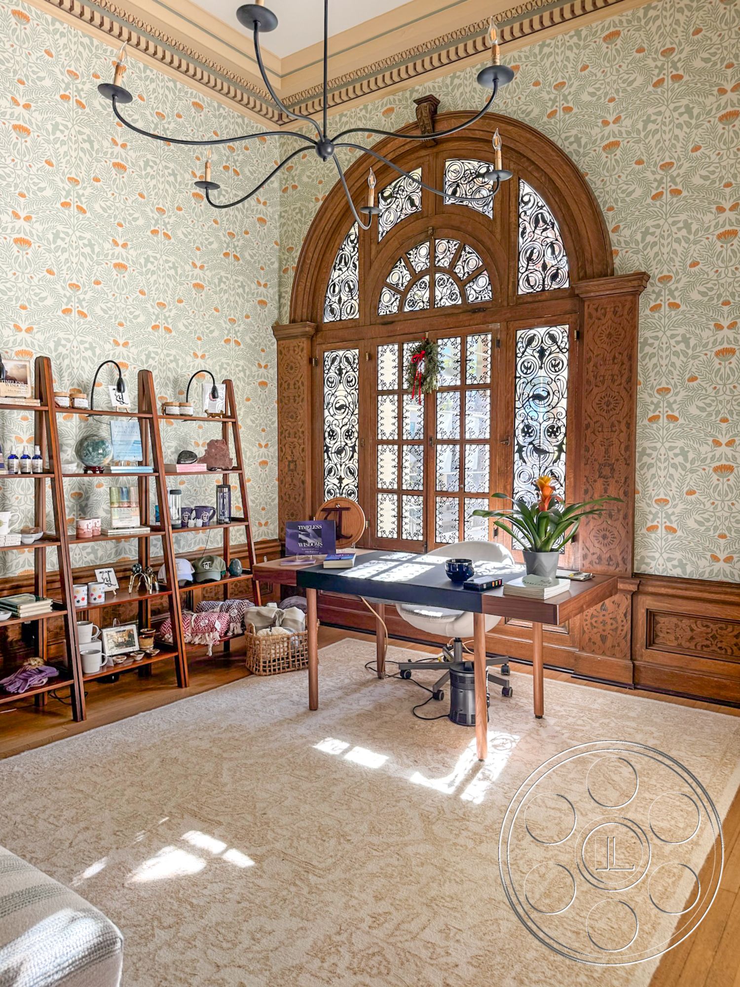 Adams Mansion - exterior, stained glass windows, historic architectural details, indoor potted plant, open shelving units, natural light flooding through windows, ornate wooden door with intricate carvings, floral wallpaper with green and orange patterns, hardwood floor with decorative rug, exposed wooden crown molding, contemporary desk with rolling chair, modern chandelier with multiple arms, cozy study nook, traditional window treatments