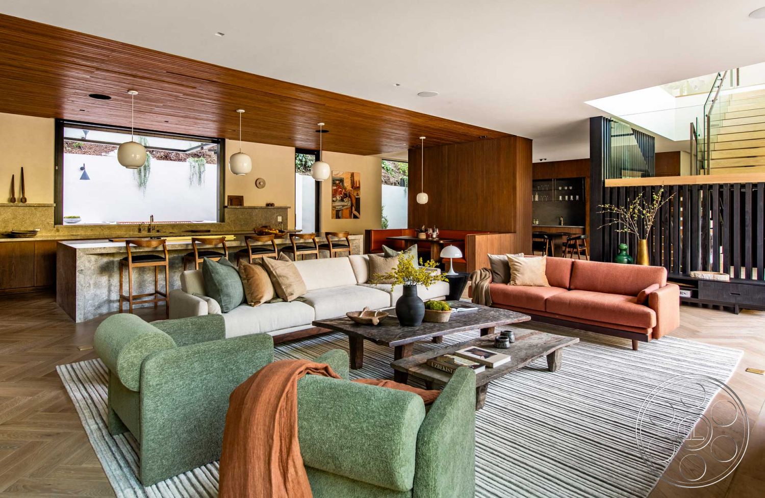 Modern 520 - interior exposed wood ceiling beams, interior marble kitchen countertop, interior minimalist coffee table, interior walnut wood cabinetry, interior hardwood herringbone flooring, interior glass pendant lighting, interior natural wood dining table, interior concrete kitchen island, interior black steel open stair railing, interior light-filled living area, interior cream sectional sofa, interior textured linen throw pillows, interior mid-century modern accent chairs, interior rustic wood feature wall, interior dark-toned wall paneling, interior plant accents for biophilic design