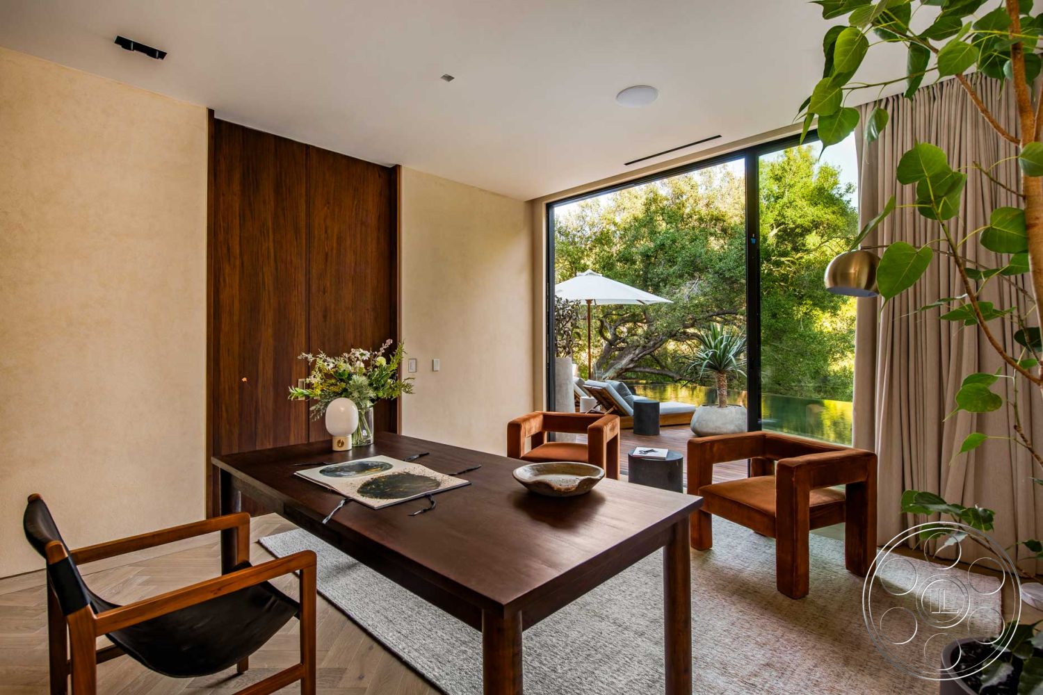 Modern 520 - interior minimalist decor, interior indoor plant decoration, interior floor-to-ceiling glass windows, interior hardwood herringbone floors, interior contemporary lighting fixtures, interior functional workspace, interior contemporary accent chairs, interior wood paneling wall, interior modern round dining table, interior beige textured plaster walls, interior natural light room, interior plant-filled corner, interior floating shelves, interior stylish decorative bowl, interior serene view of greenery