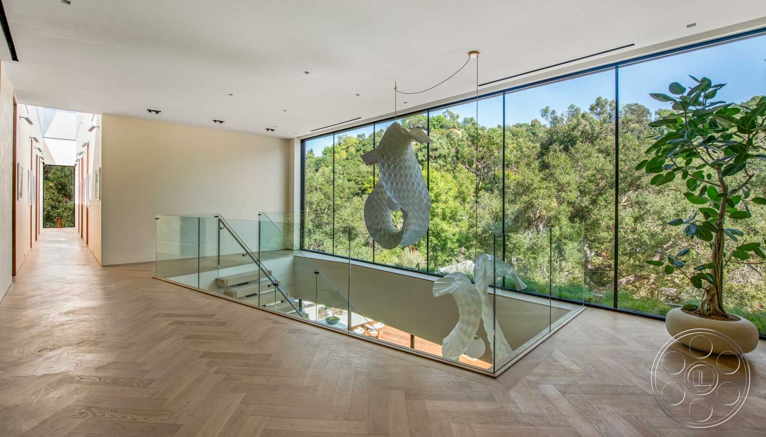 Modern 520 - minimalist design elements, floor-to-ceiling windows, modern art sculpture, floating staircase, contemporary interior, exposed wood ceiling beams, glass partition walls, natural light emphasis, herringbone hardwood flooring, green forest setting