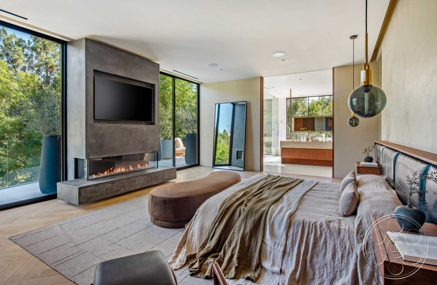 Modern 520 - modern pendant lighting, floor-to-ceiling windows, vaulted ceiling, contemporary design elements, textured plaster walls, open-concept layout, lush greenery view, earth-tone color palette, interior bedroom, wood beam ceiling, built-in wooden shelving, plank hardwood flooring, rectangular area rug, concrete fireplace surround, curved accent seating, neutral fabric bedding