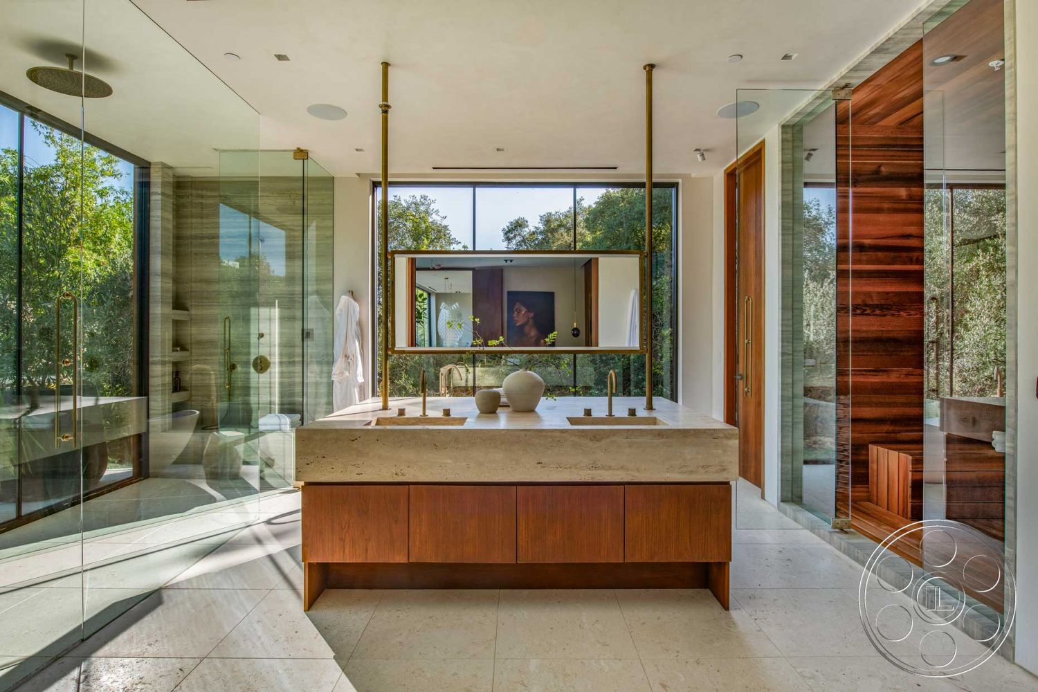 Modern 520 - soft neutral color palette, open layout, wood cabinetry, glass shower enclosure, floor-to-ceiling windows, ambient natural lighting, modern minimalist design, interior bathroom, natural stone shower walls, large frameless mirror, concrete bathroom countertop, high-end faucet fixtures, rectangular vanity design, textured porcelain tile flooring, scenic nature view, elegant wood accent wall