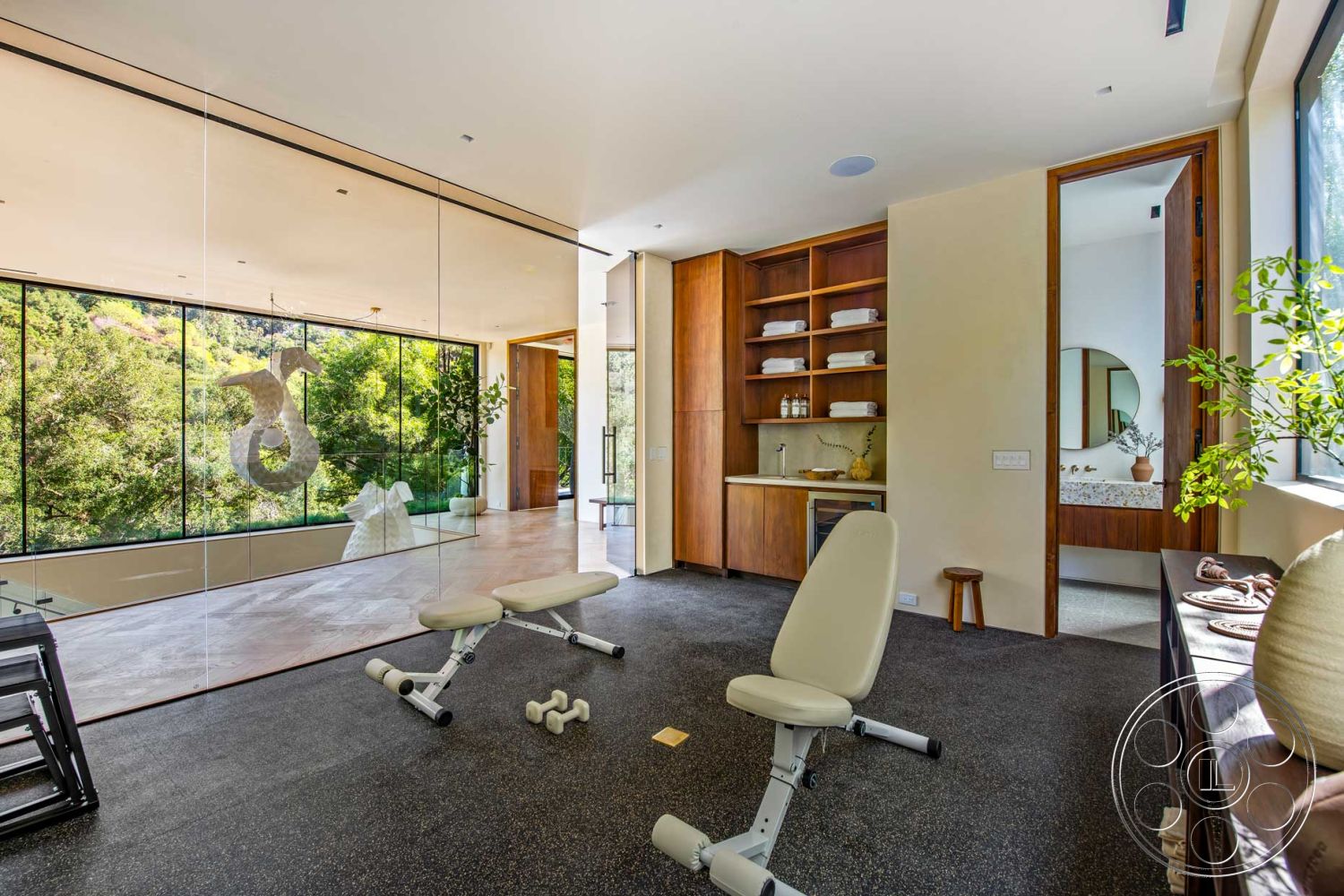 Modern 520 - concrete flooring, open concept layout, floor-to-ceiling windows, textured plaster walls, low-profile ceiling, modern minimalist design, natural light ambiance, glass wall partition, indoor greenery feature, wood panel cabinetry, interior exercise room, marble countertop bar
