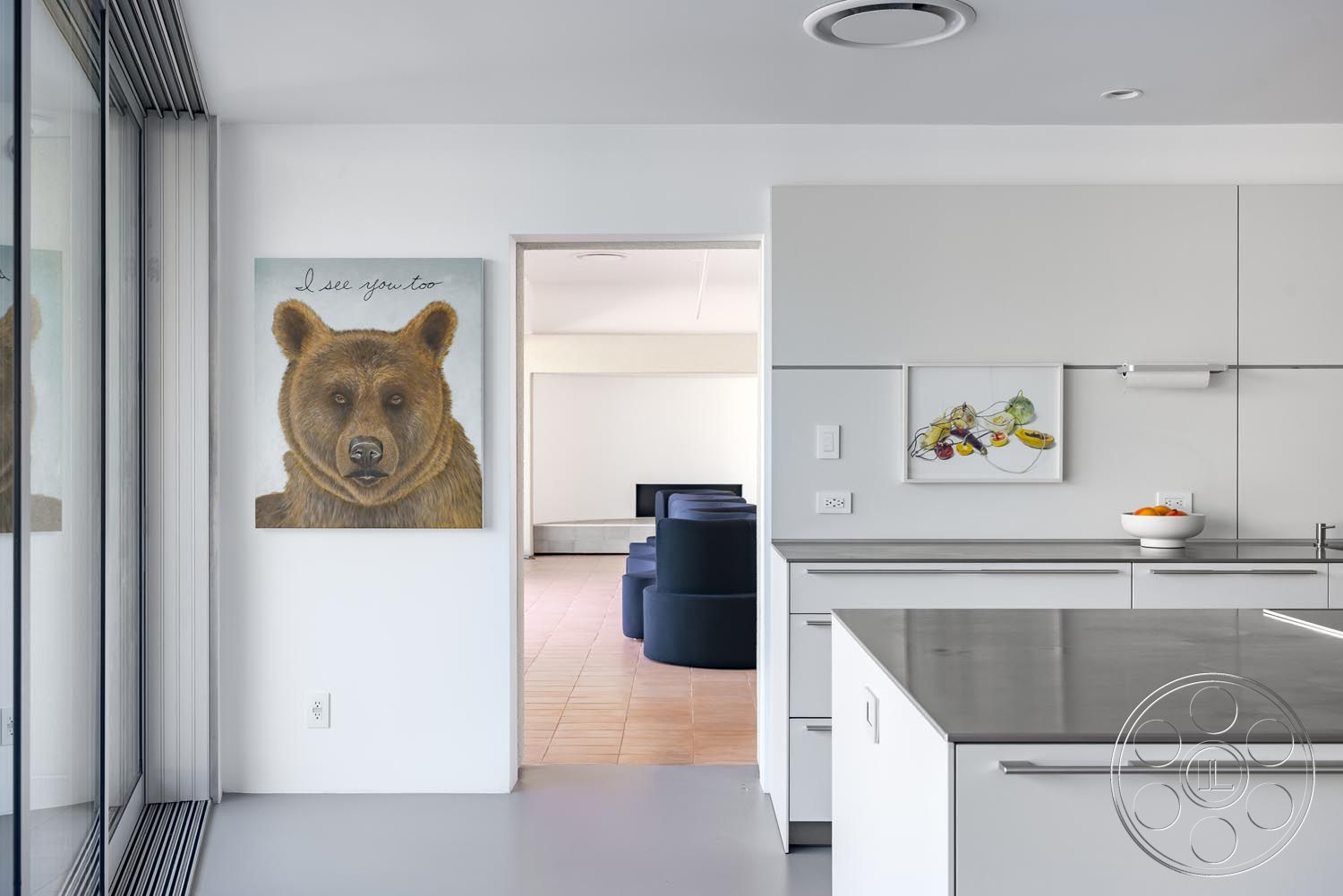 Modern 521 - interior neutral color palette, interior stainless steel kitchen appliances, interior floor-to-ceiling windows, interior open floor plan, interior recessed lighting fixtures, interior minimalist design elements, interior glass wall partition, interior spacious living area, interior seamless indoor-outdoor transition, interior contemporary art wall decor, interior concrete kitchen countertops, interior seamless vinyl flooring, interior drywall painted white, interior flat-panel kitchen cabinets, interior tile flooring in neutral tones, interior L-shaped kitchen island, interior modern lounge area with circular couches, interior utility closet with built-in shelves, interior contemporary ceiling design