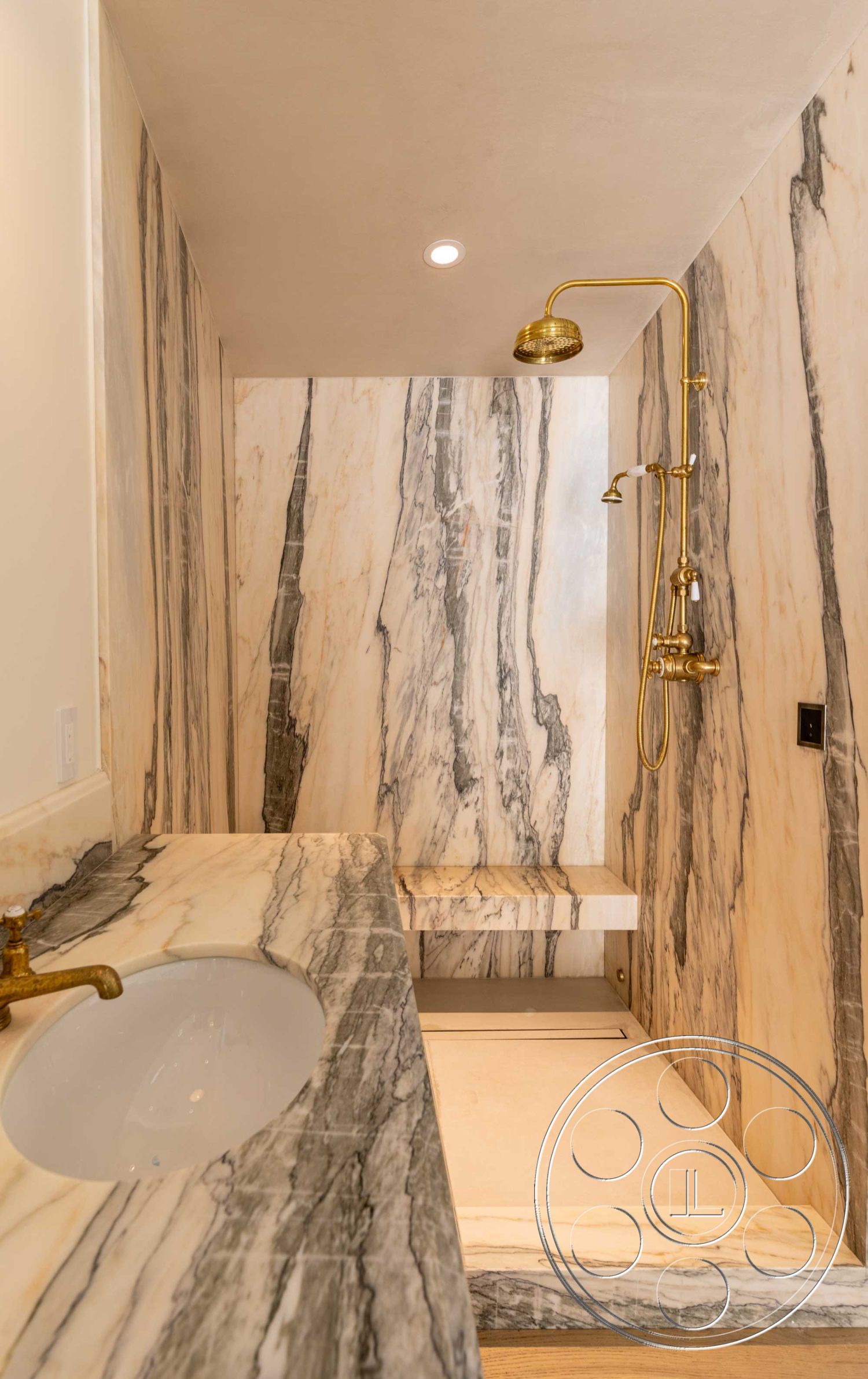 Modern Farmhouse 19 - interior recessed lighting, interior marble shower walls, interior marble vanity countertop, interior marble shower flooring, interior gold shower fixtures, interior built-in shower bench, interior seamless shower design, interior modern bathroom layout, interior minimalist bathroom aesthetic