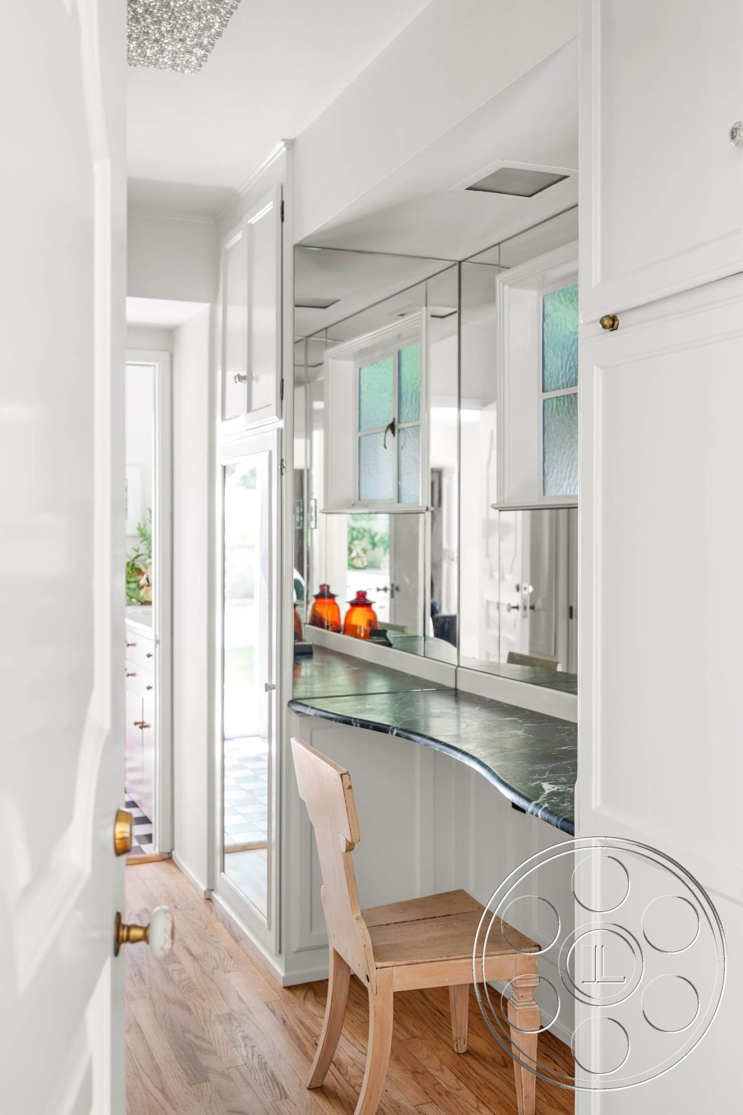 English 60 - interior glass window treatments, interior open floor plan, interior adjustable lighting fixtures, interior natural light flooding in, interior marble countertop office desk, interior hardwood flooring hallway, interior mirrored wall accent detail, interior white cabinetry kitchen, interior beige wooden chair, interior transitional design style, interior elegant home workspace