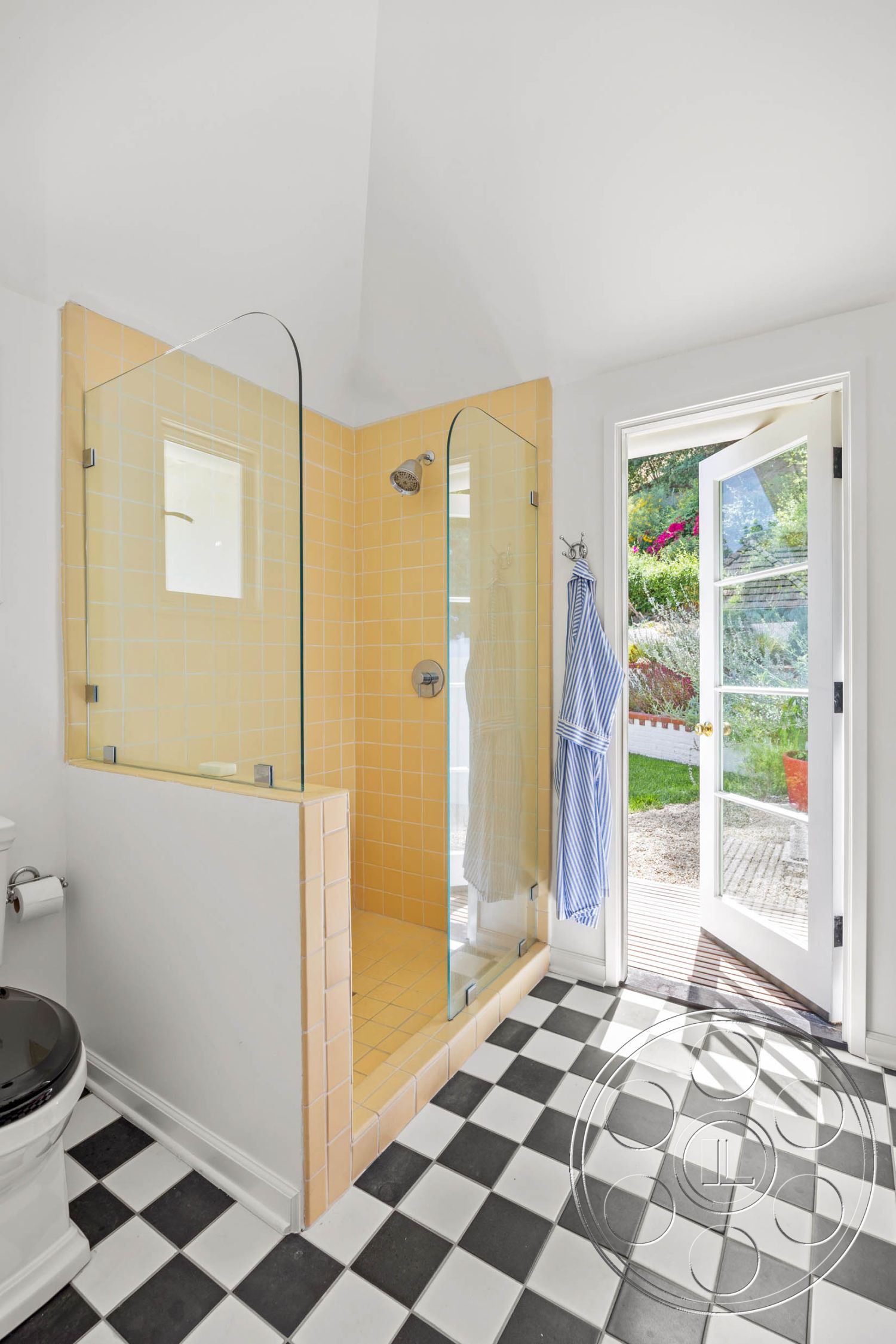 English 60 - black and white floor tiles, glass shower doors, modern bathroom fixtures, interior bathroom, white painted walls, open shower design, white wooden door, yellow tiled shower walls, checkered tile flooring, outdoor view with garden, stylish shower design