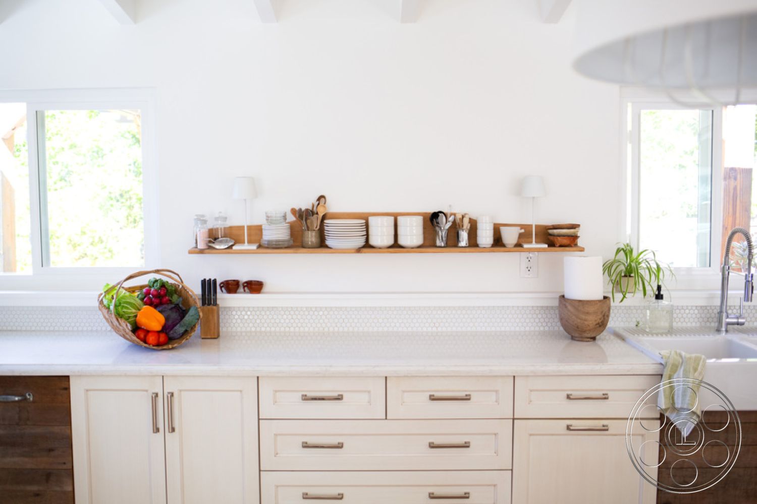 Ranch 33 - minimalist kitchen design, white painted walls interior, open shelving kitchen storage, contemporary kitchen decor, hexagonal tile kitchen backsplash, light wood kitchen cabinets, white marble countertop kitchen, stainless steel sink kitchen, natural light kitchen window, granite countertop edge detail, wood beam ceiling kitchen, decorative kitchen bowl with fruits, modern pendant lighting kitchen