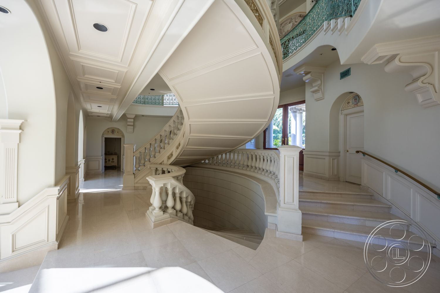 Pacifica Estate - high ceilings, neutral color palette, natural light, exterior, open floor plan, transitional space, floor-to-ceiling windows, marble flooring, arched doorways, craftsman style, grand entrance, intricate moldings, curved staircase, luxury interior design, classic architectural elements, elegant foyer, coffered ceiling details, ornate railing details, plaster wall finishes, stylish handrails