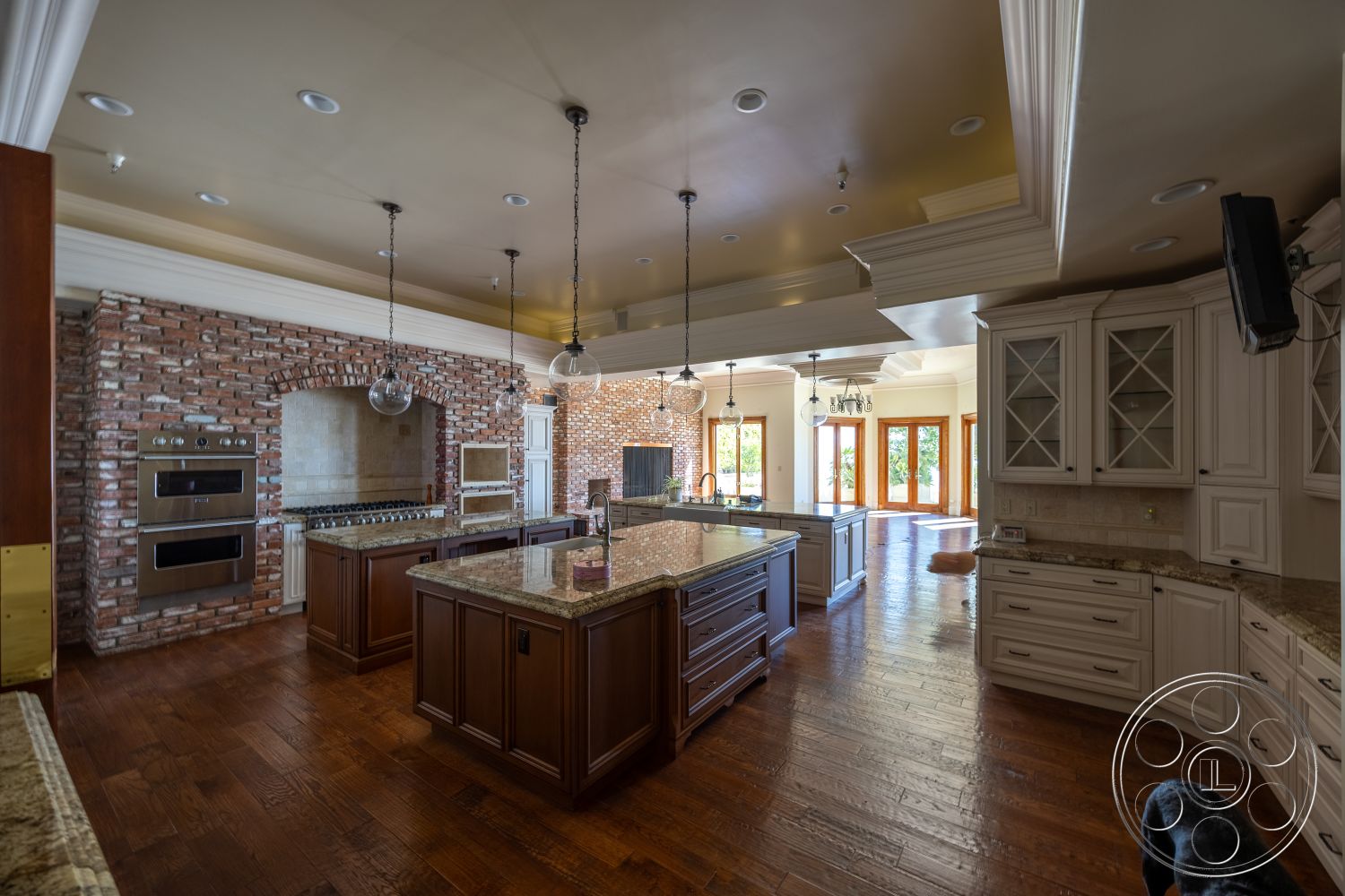 Pacifica Estate - neutral color palette, coffered ceiling, open floor plan, stainless steel appliances, granite countertops, modern farmhouse style, ceramic tile backsplash, pendant lighting fixtures, interior kitchen, hardwood kitchen floors, exposed brick accent wall, crown molding details, marble kitchen island, large windows with views, spacious interior layout, kitchen dining area, custom wood cabinets, luxurious kitchen design, elegant kitchen finishes