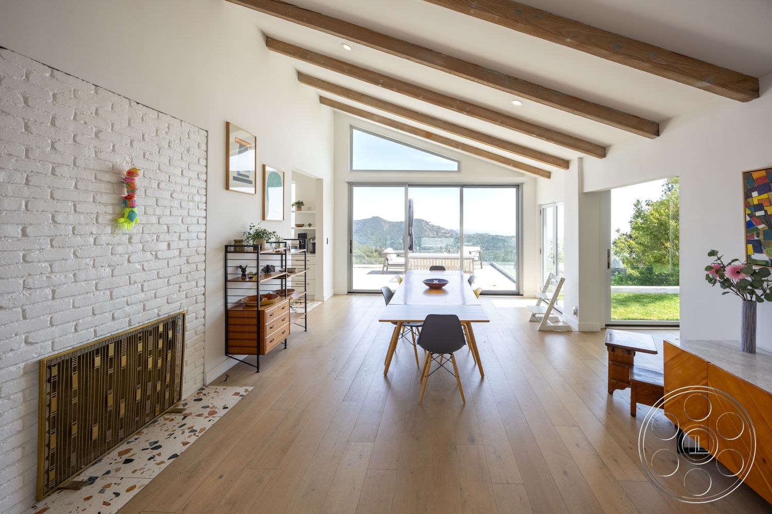 Retro 288 - terrazzo flooring, open floor plan, floor-to-ceiling windows, mountain view, modern dining room, contemporary interior, exposed wood ceiling beams, hardwood living room floors, white painted walls